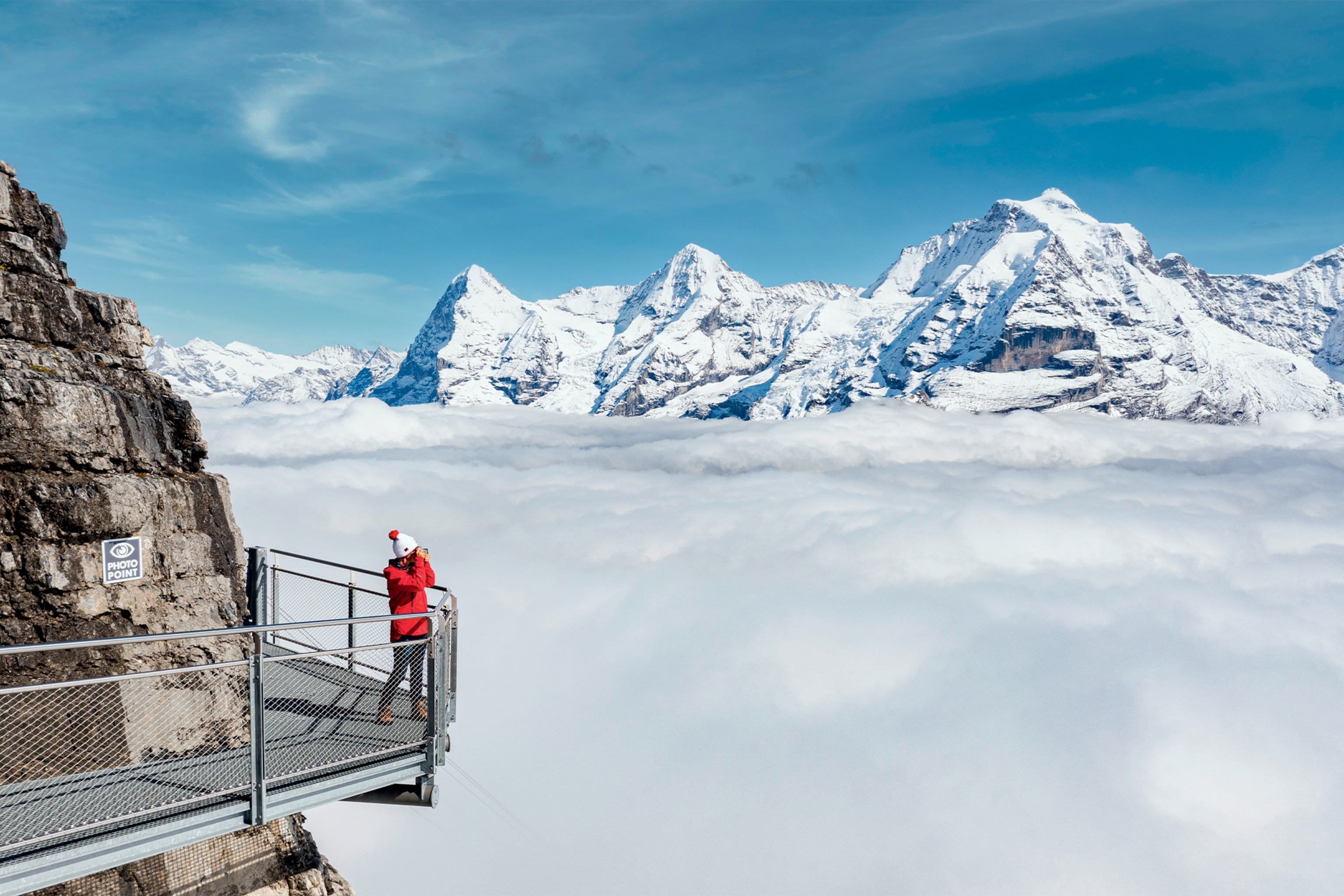 Hiker on snowcovered lookout