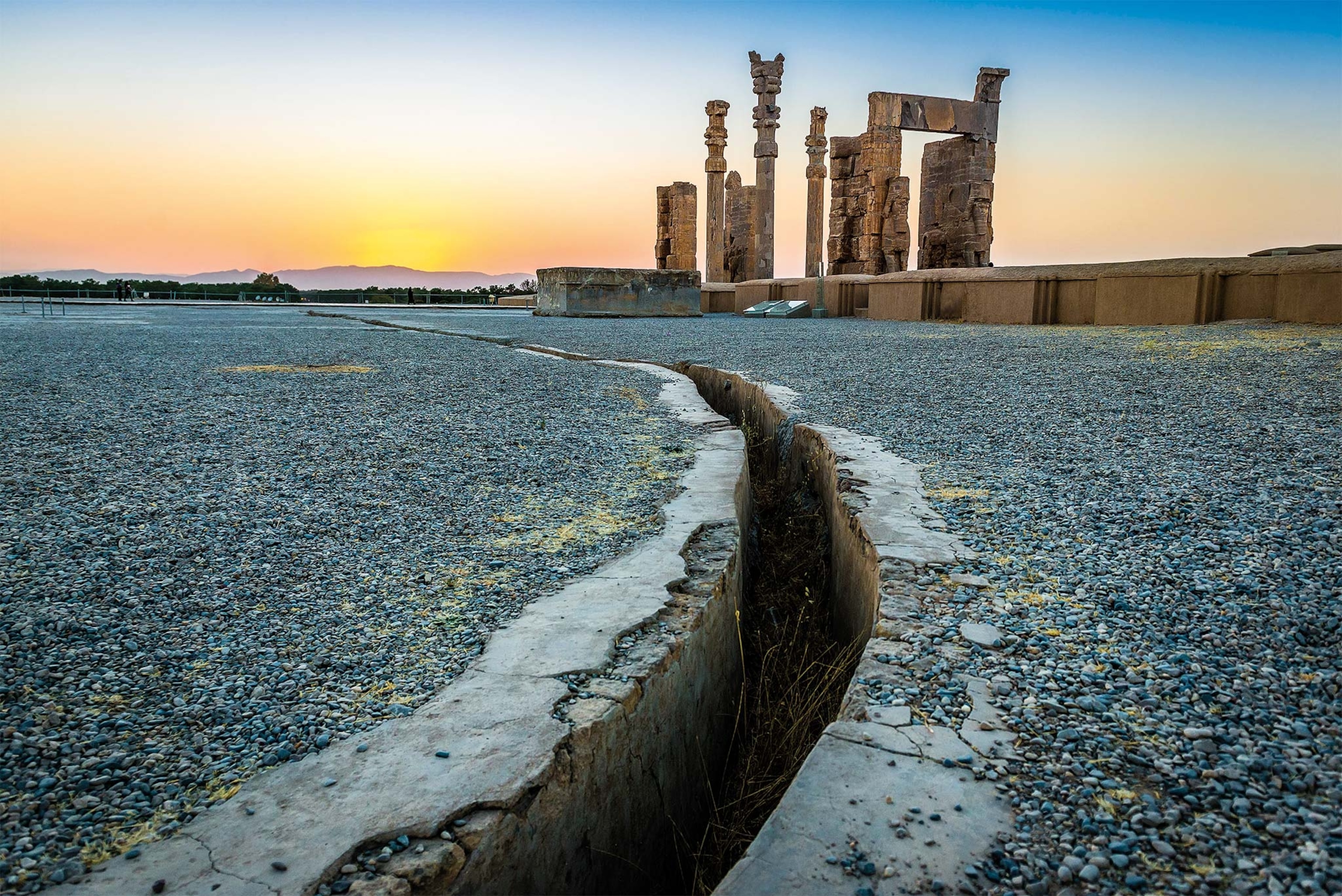 A drainage channel encircles the Gate of All Nations, built in the mid-fifth century B.C. by King Xerxes in Persepolis, the ceremonial capital of the Persian Empire. The site is near the modern city of Shiraz in southern Iran.