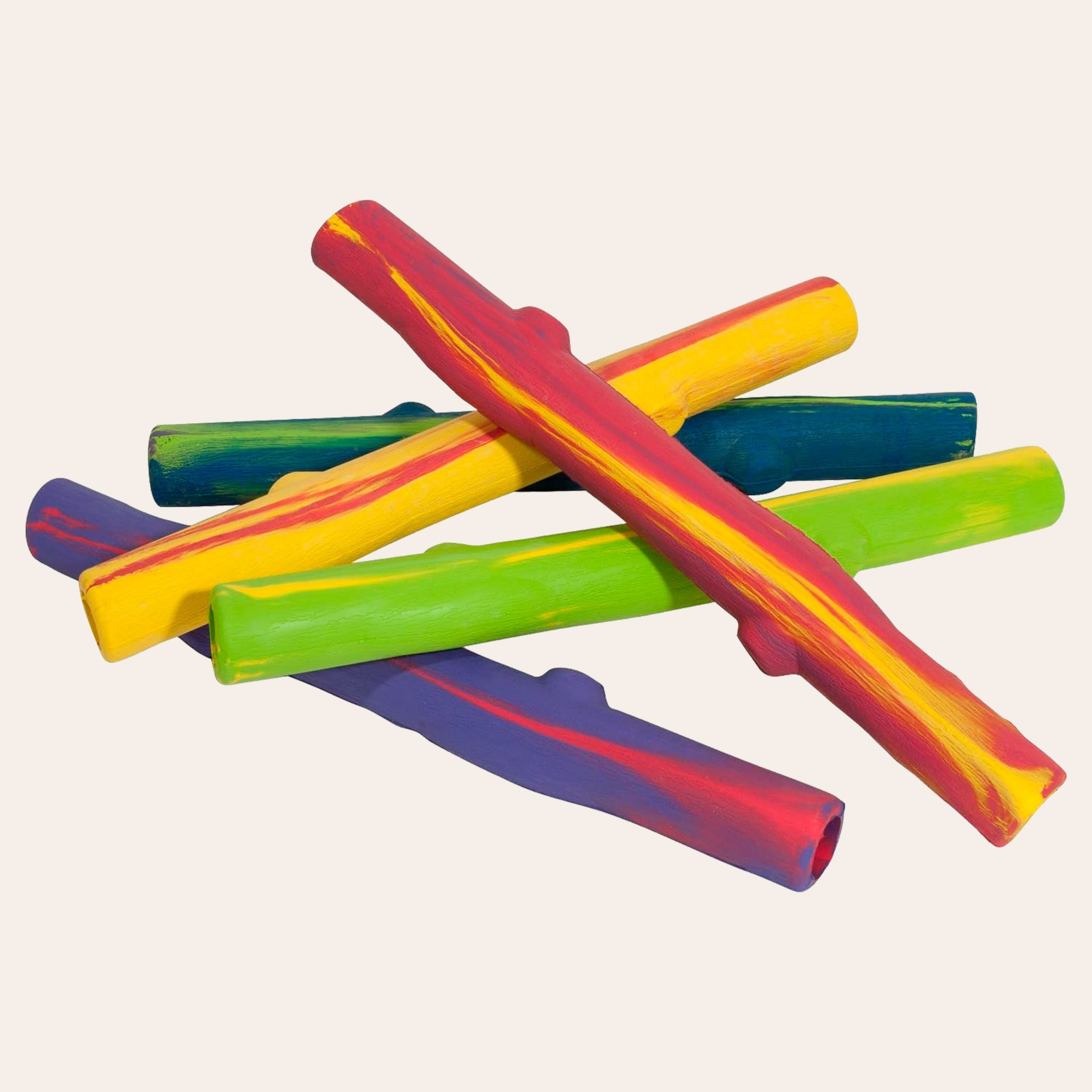 A group of 5 multi-colored rubber stick dog toys.