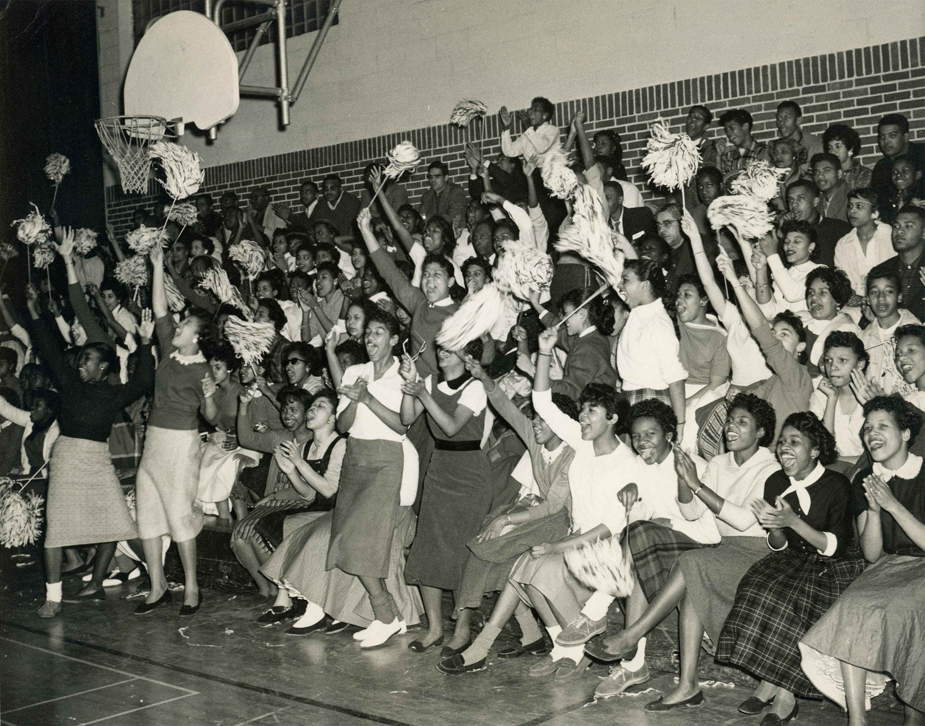 Excited students at a pep rally indoors in Gainsboro.