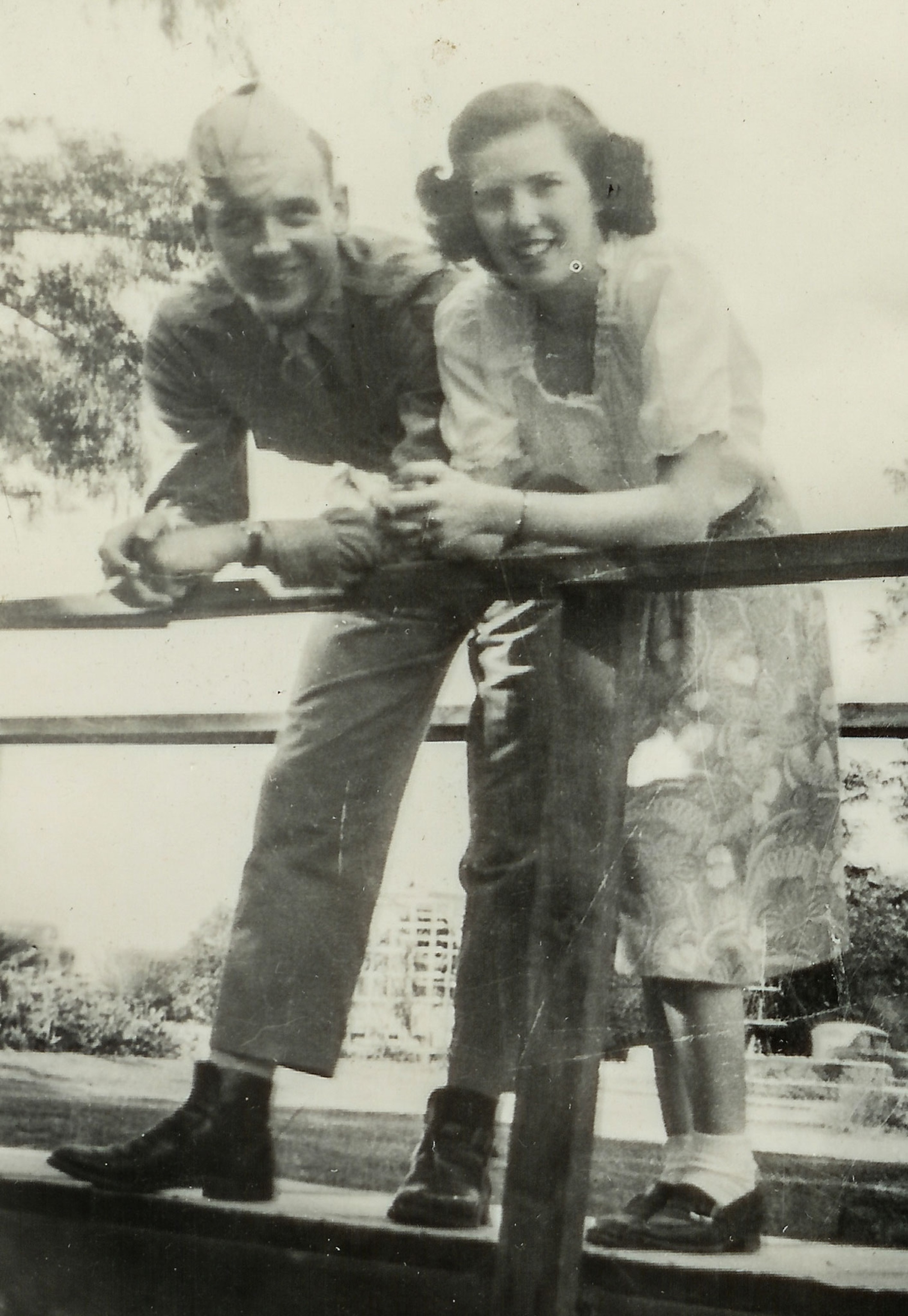 a black and white photo of a man and woman on their wedding day in 1943