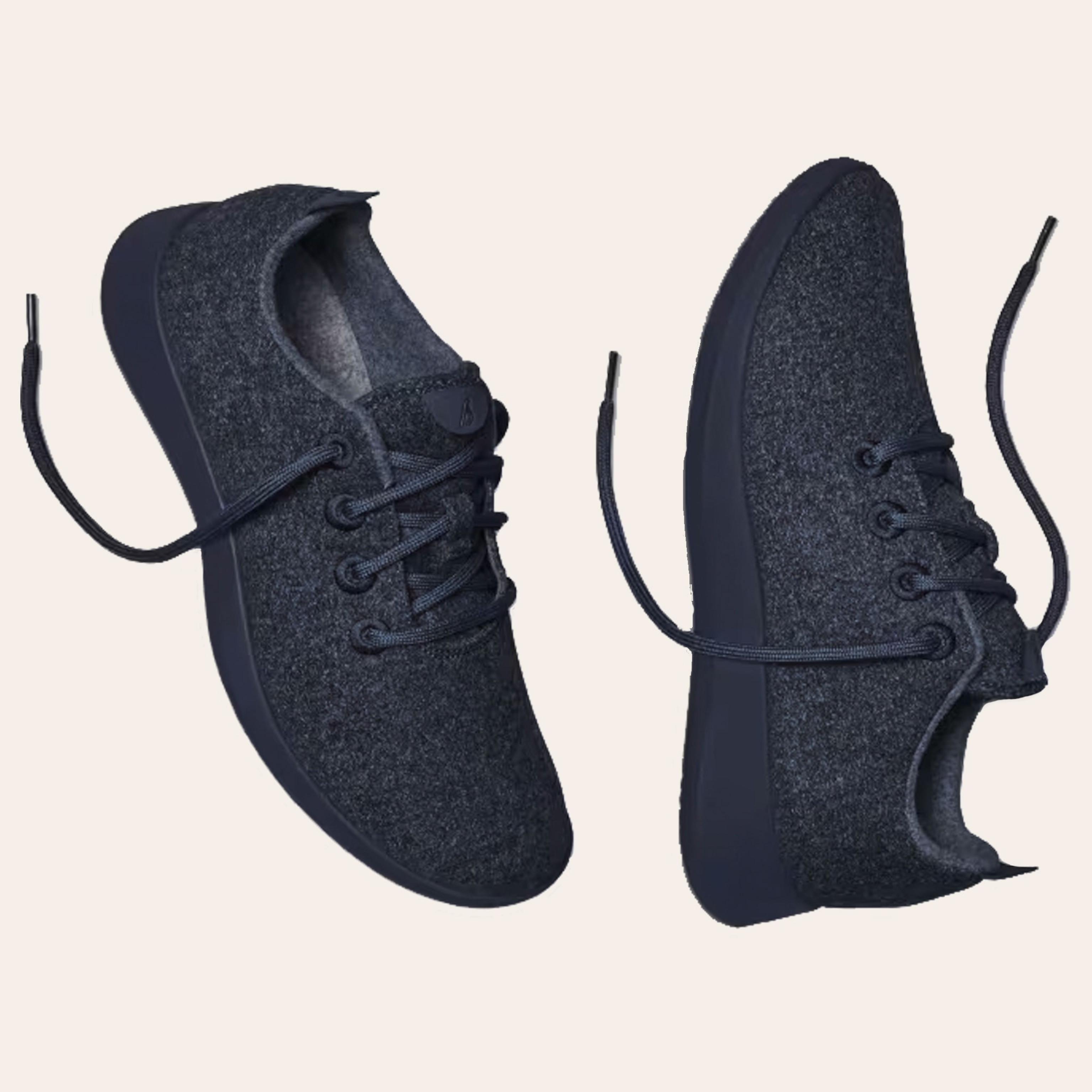 A pair of dark navy blue sneakers.