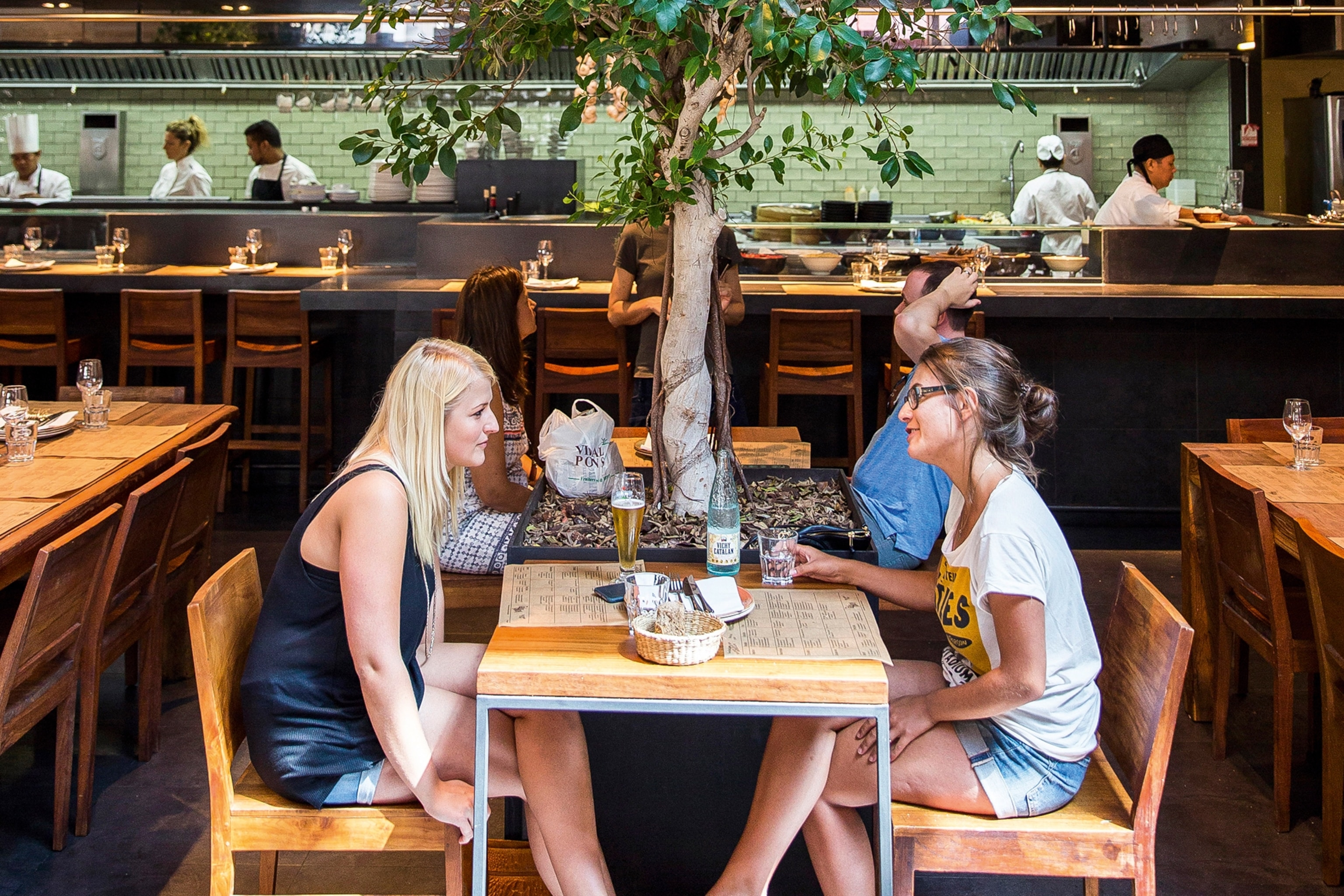 Two people having lunch at Santa Caterina Market.