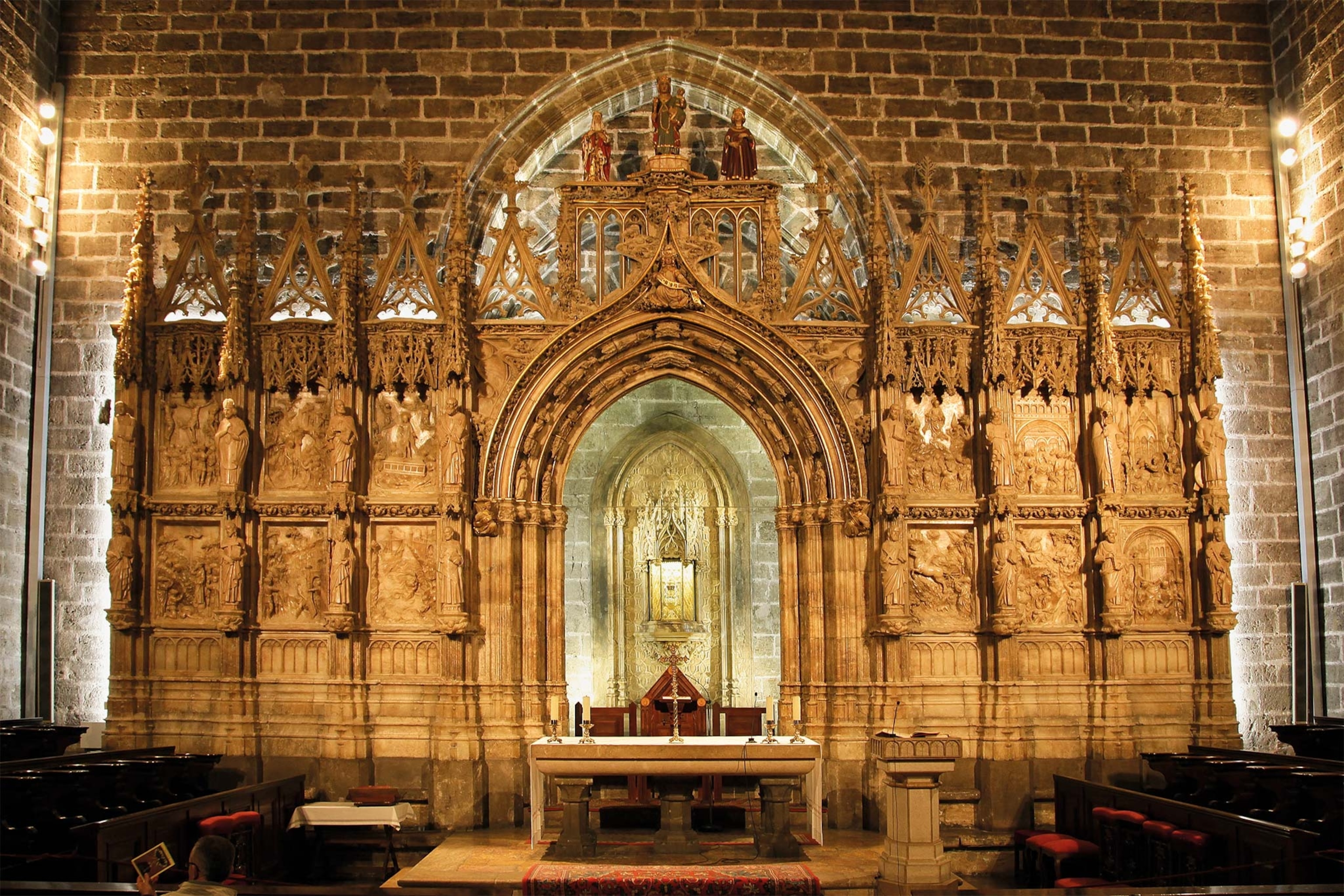 The Chalice of Valencia sits in an elaborate reliquary above an altar in the Valencia Cathedral