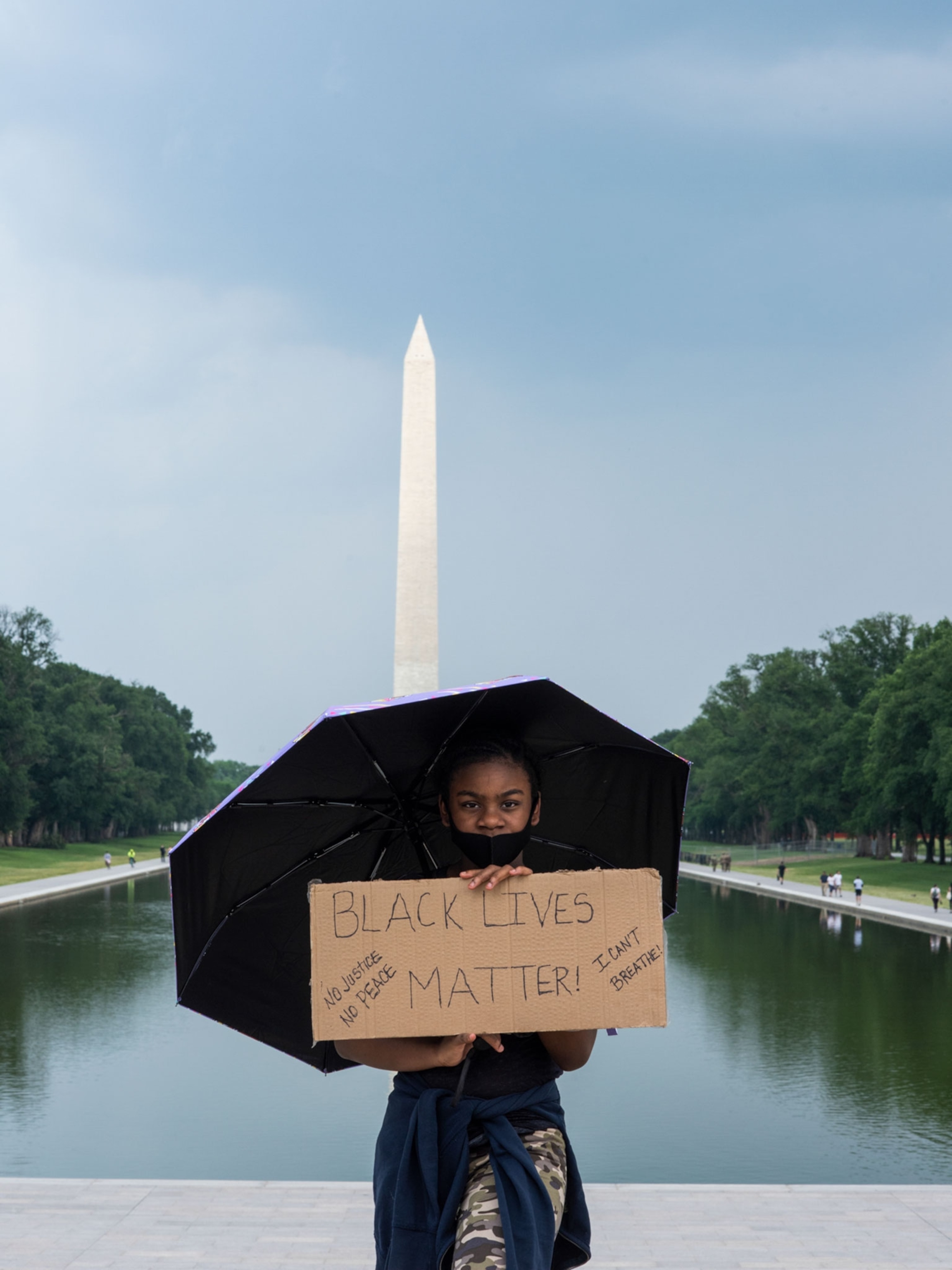 a girl at a protest in Washington D.C.