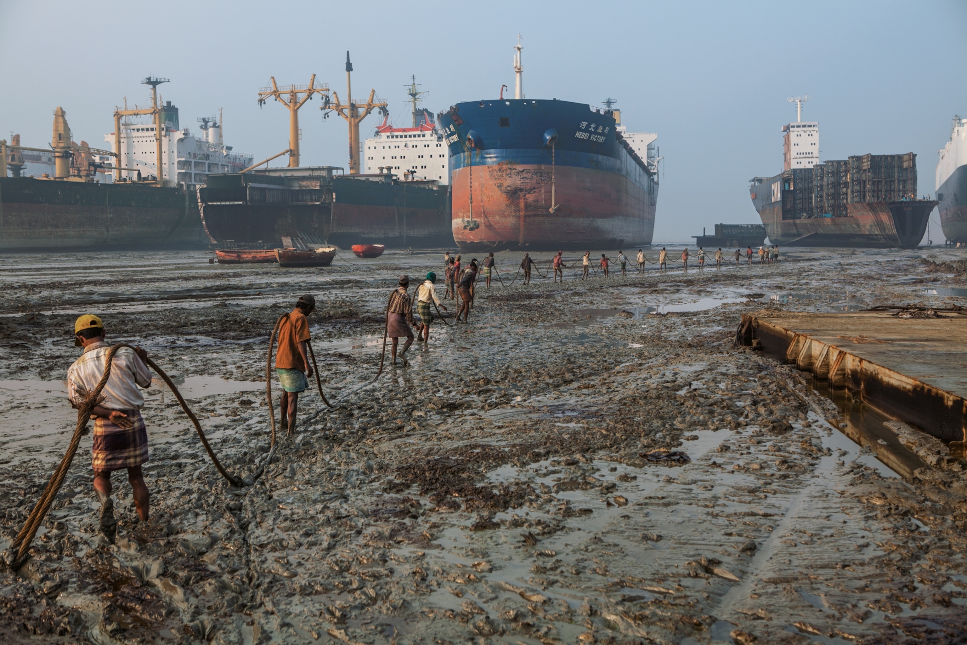 workers in a shipbreaking yard