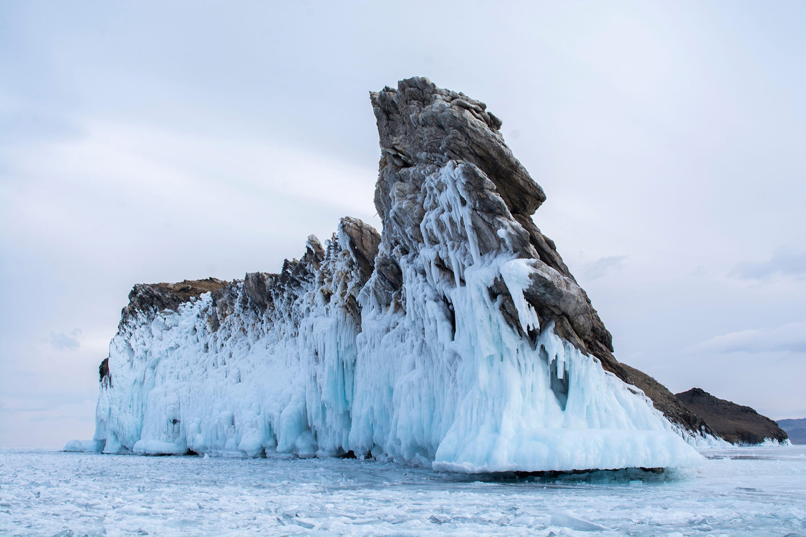 Iced over Rock island in Lake Bikal, Russia