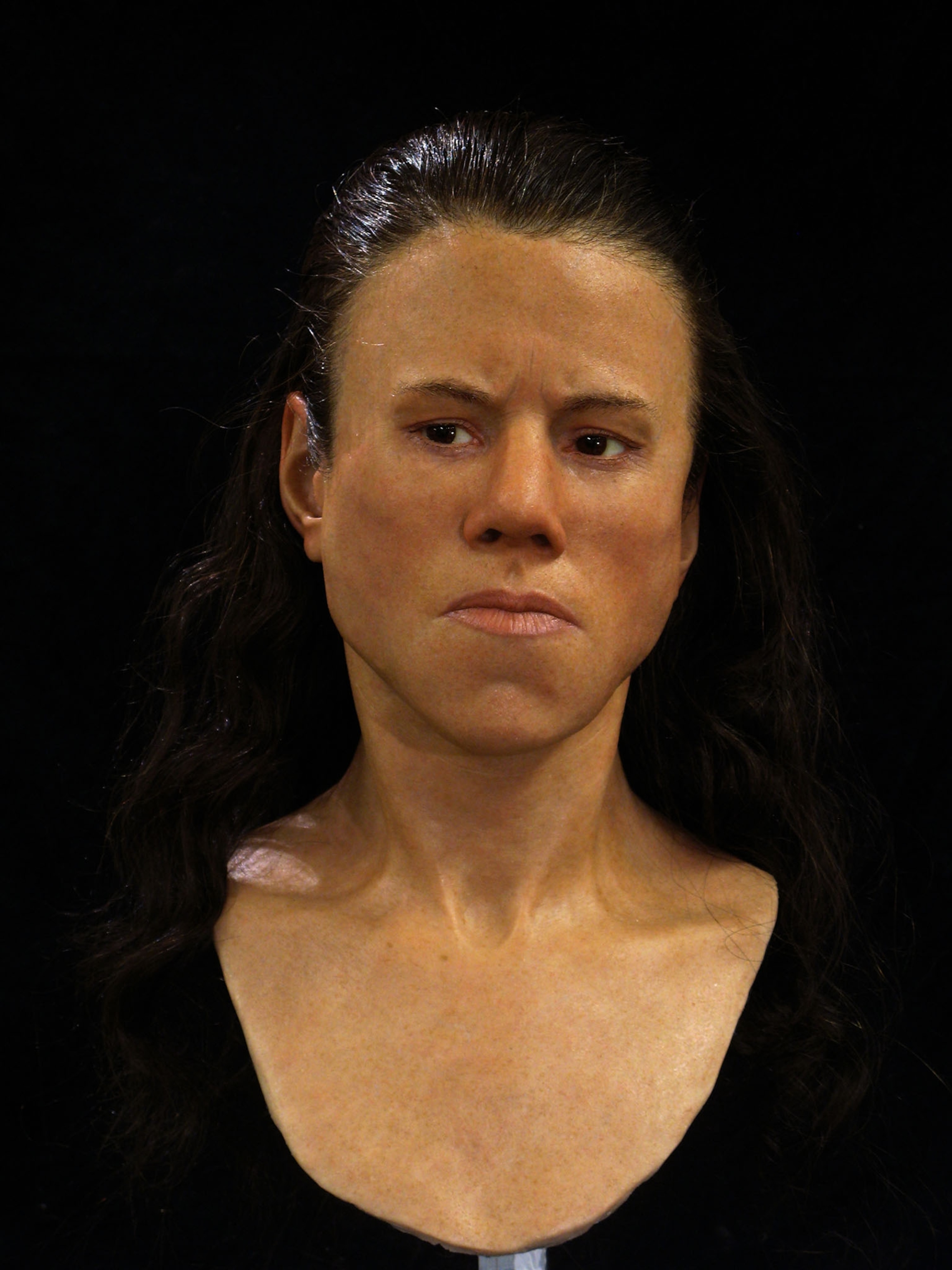 young woman in black dress.