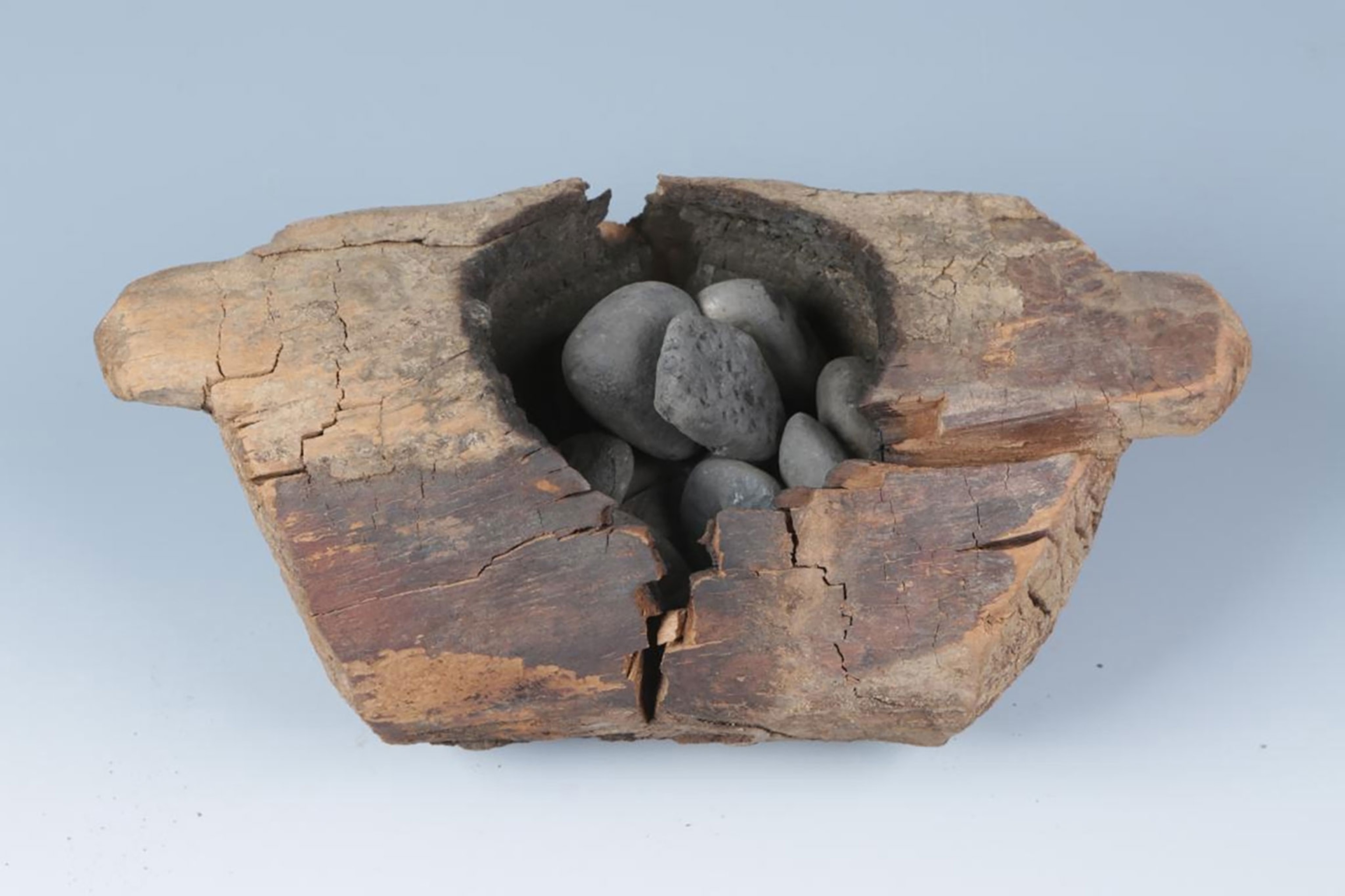 a brazier and burnt stones