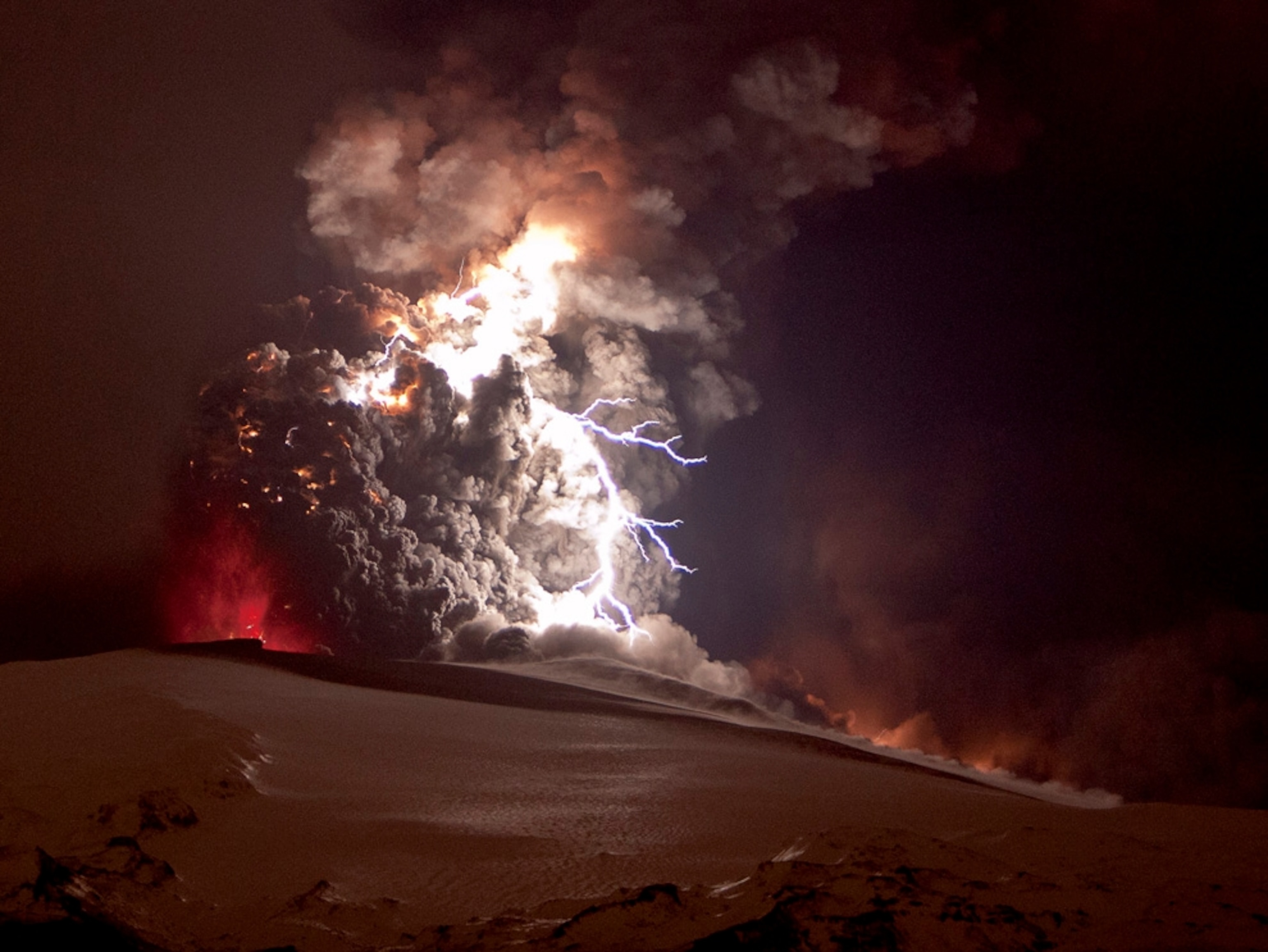 Lightning flash within a volcanic ash cloud