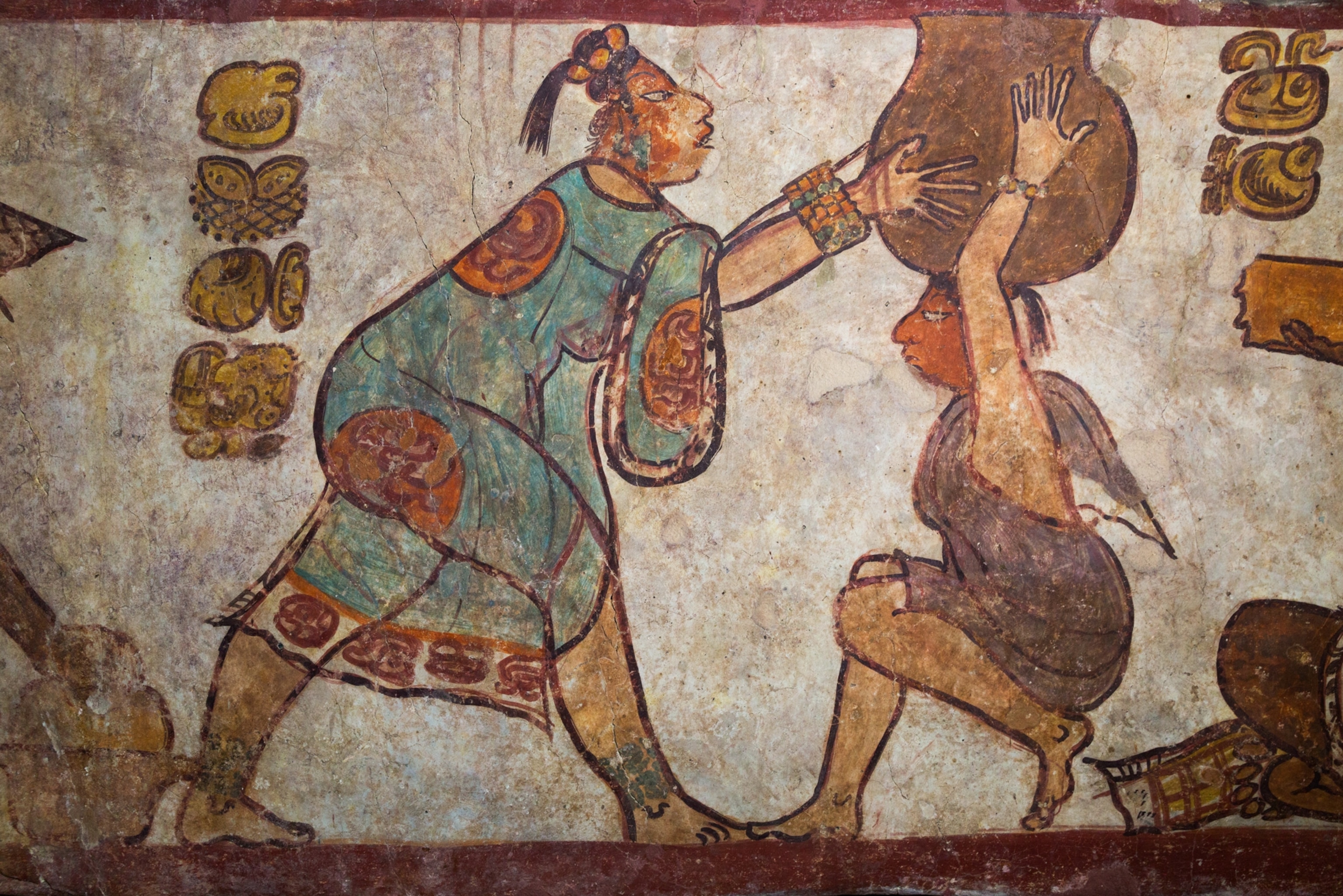 an everyday scene during the reign of the Snake kings painted on a pyramid at Calakmul