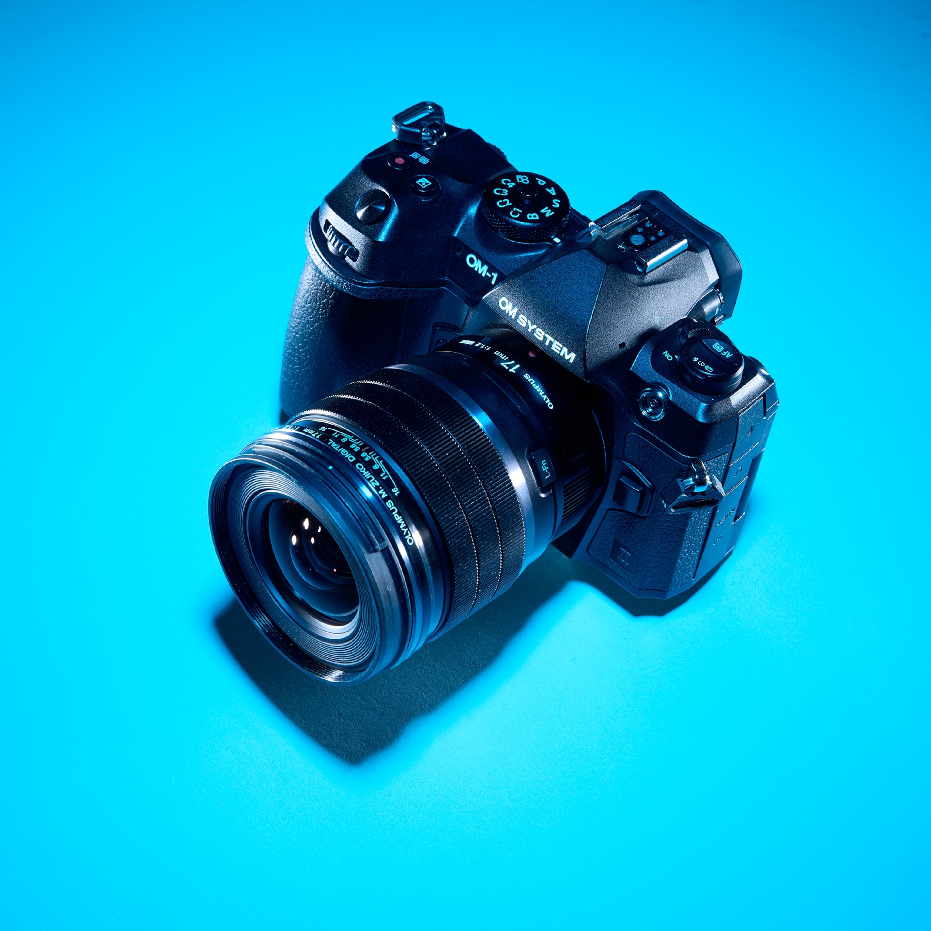 camera OM System OM-1 Mark II on colorful background