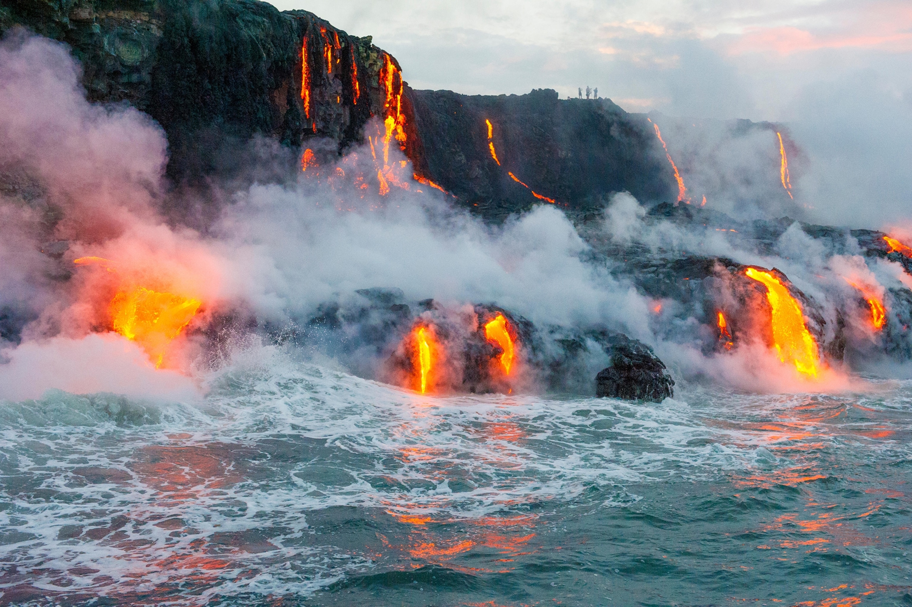 lava flowing into the Pacific Ocean in Hawaii.
