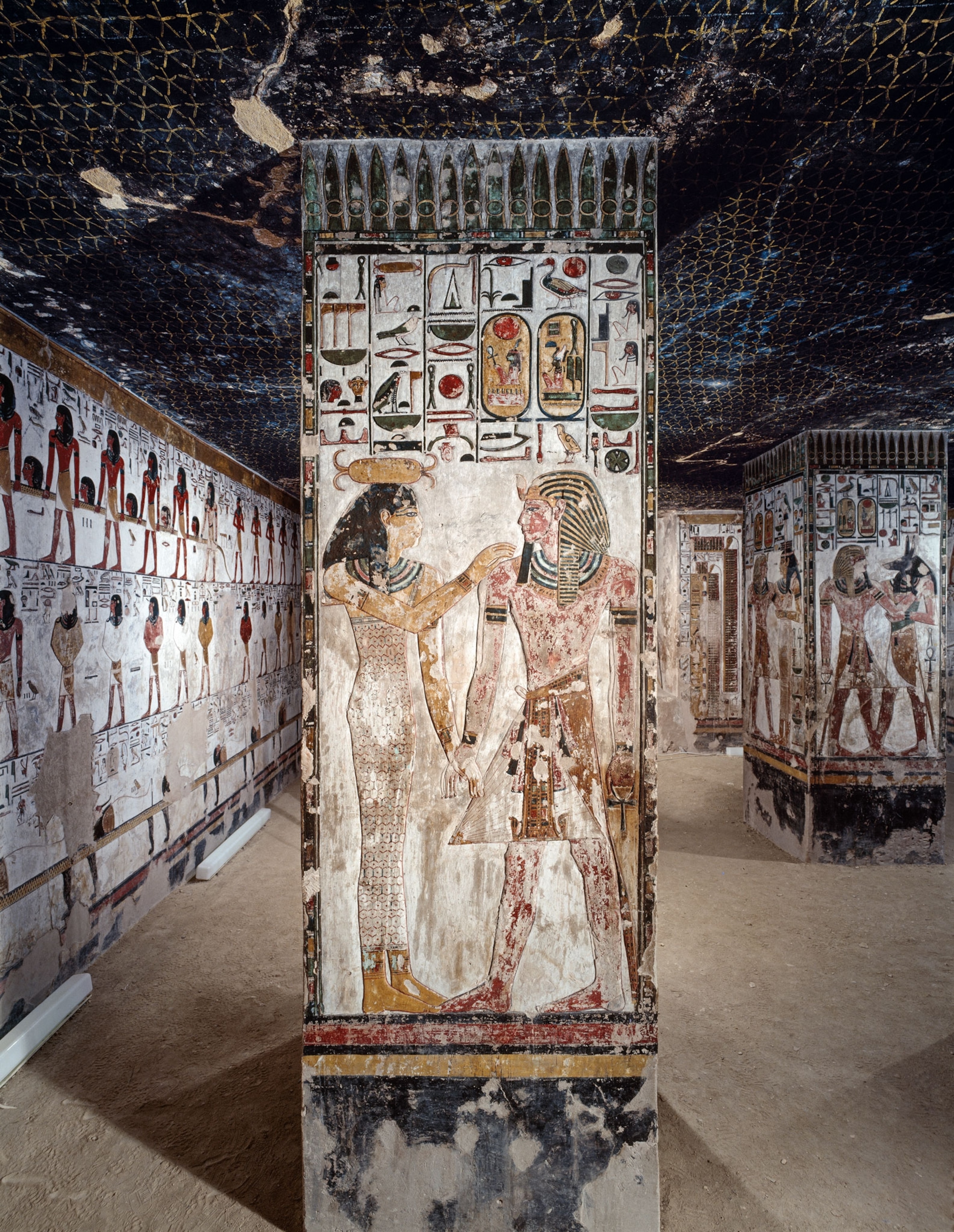 a painted pillar inside a tomb