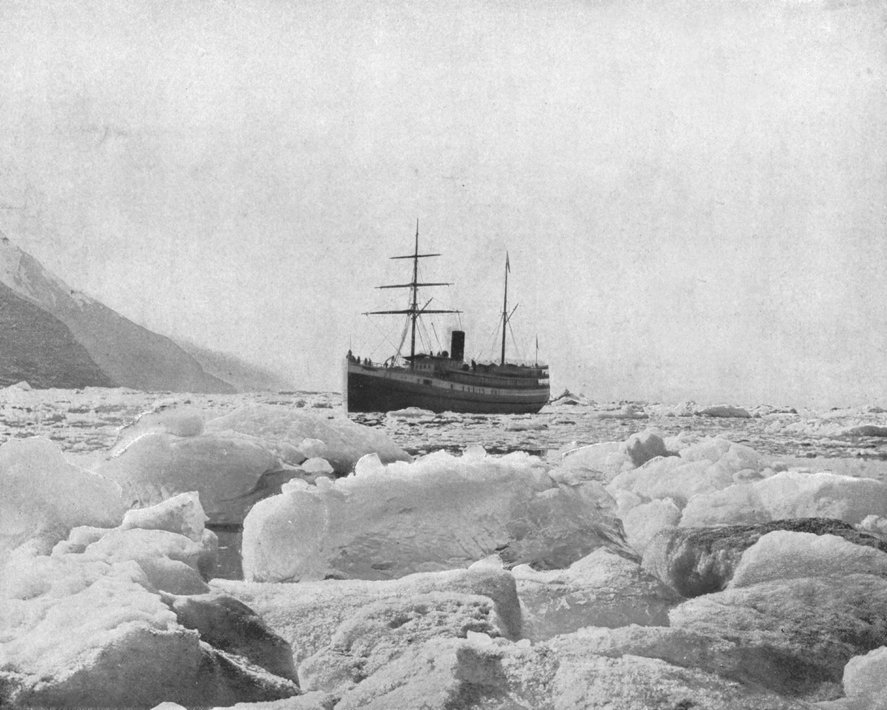 Historical black and white image of a steamboat
