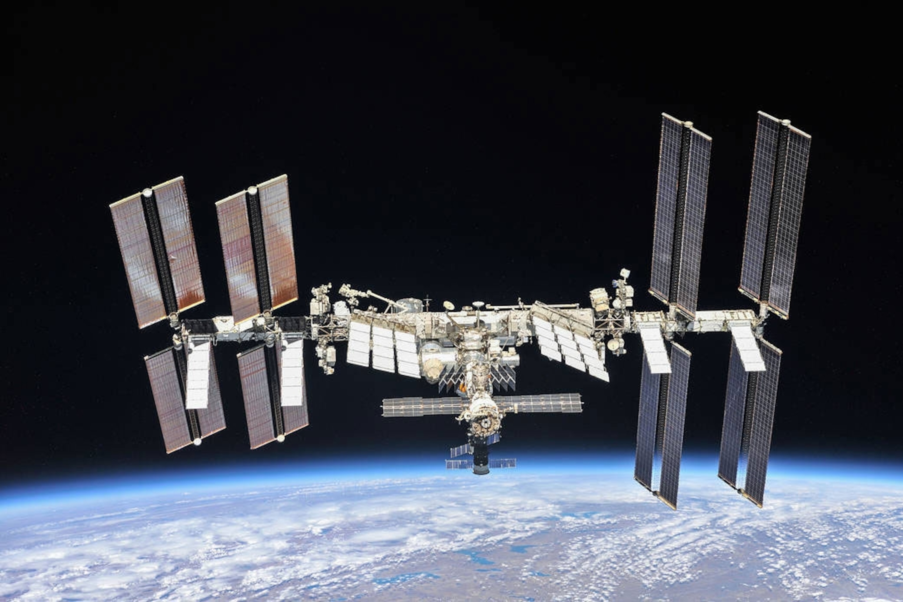 The ISS with the Earth in the background.