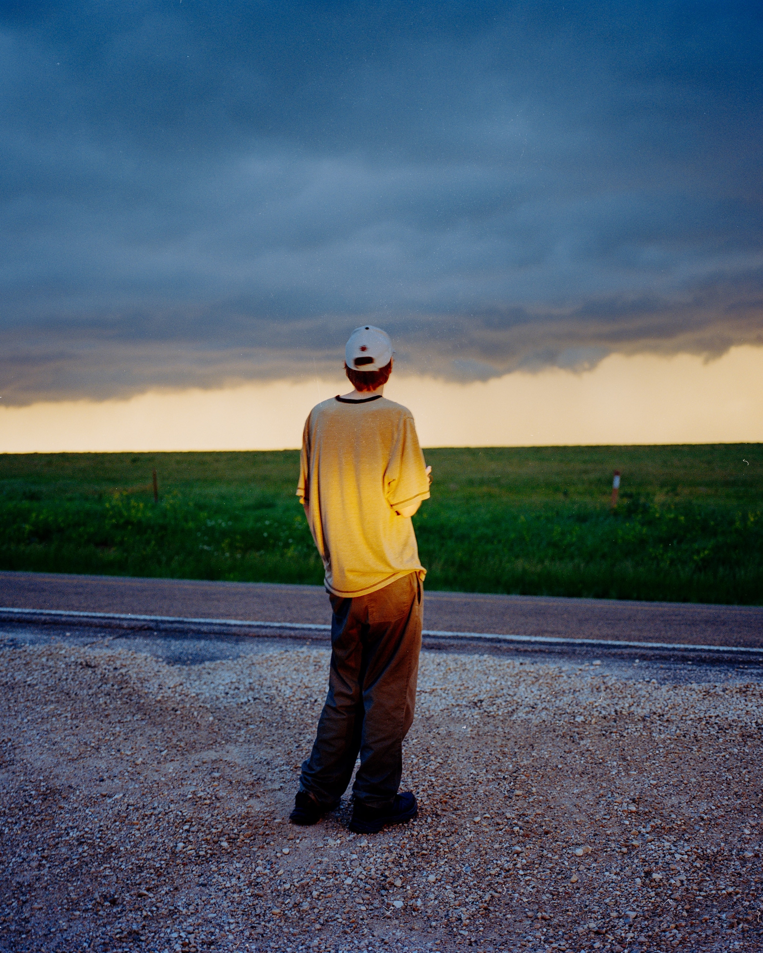 A stormchaser admires a shelf cloud in central Kansas.