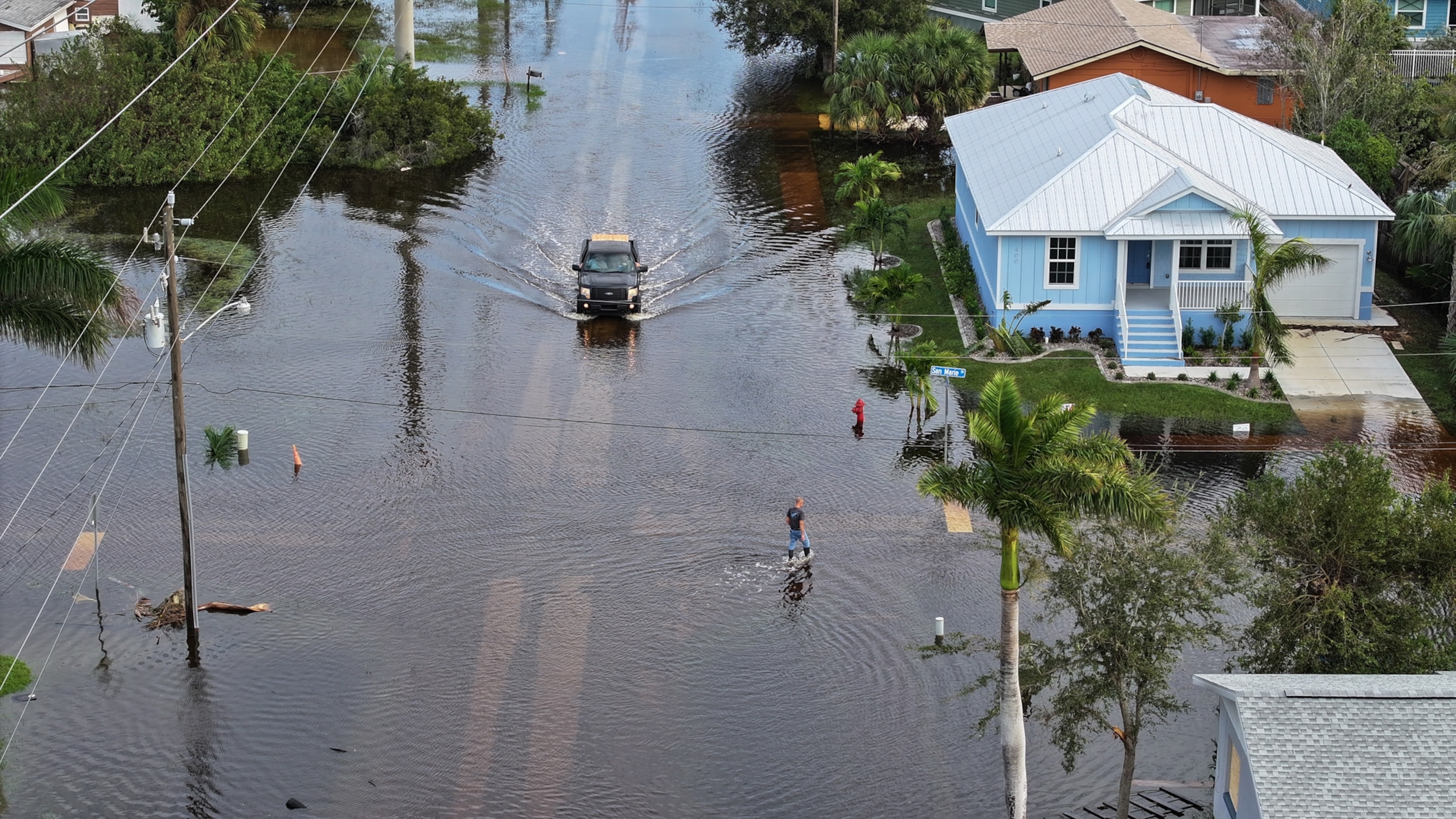 An elevated view of a flooded residential road in Florida.