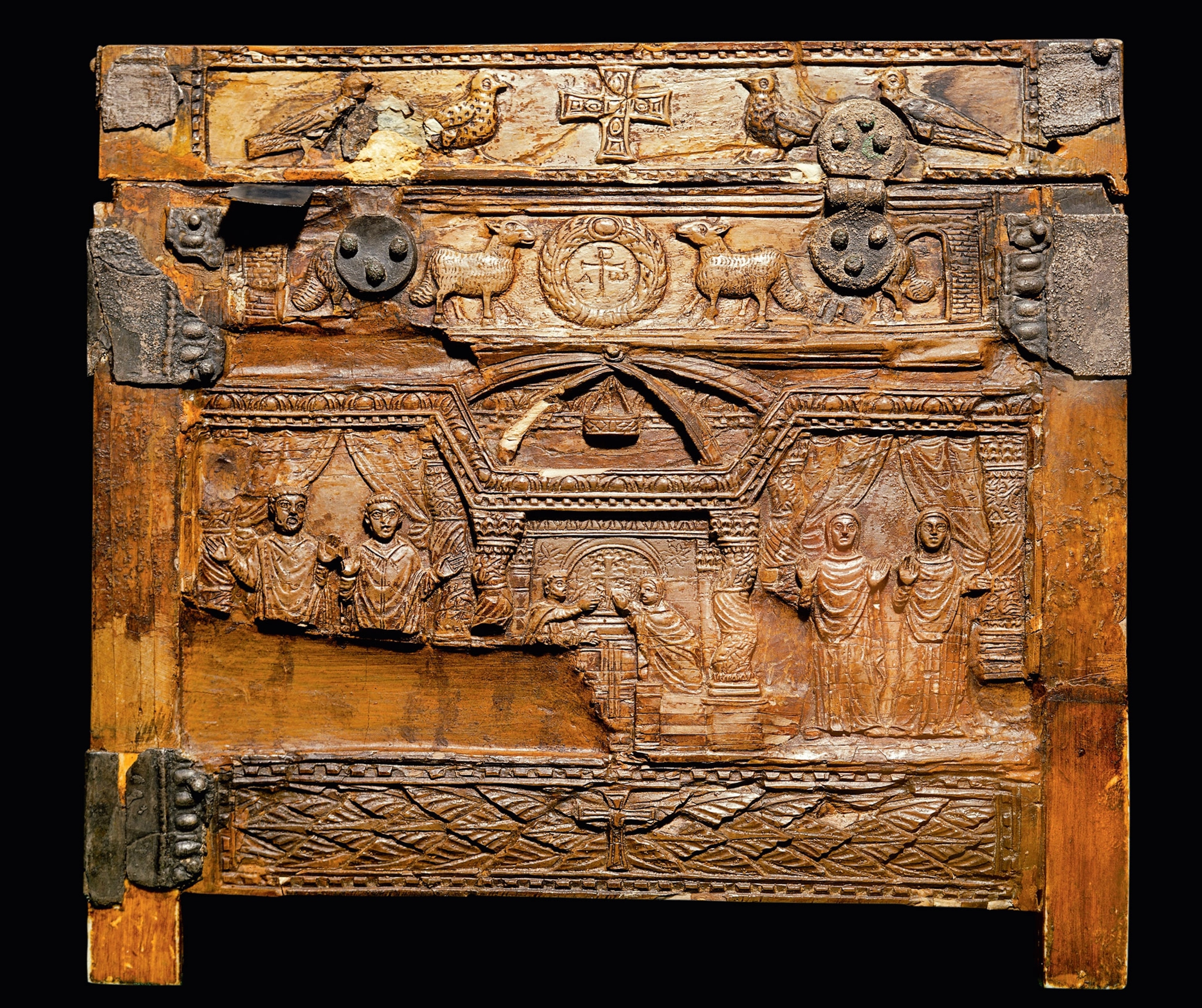 A wooden casket depicts Constantine I and his family in the first basilica