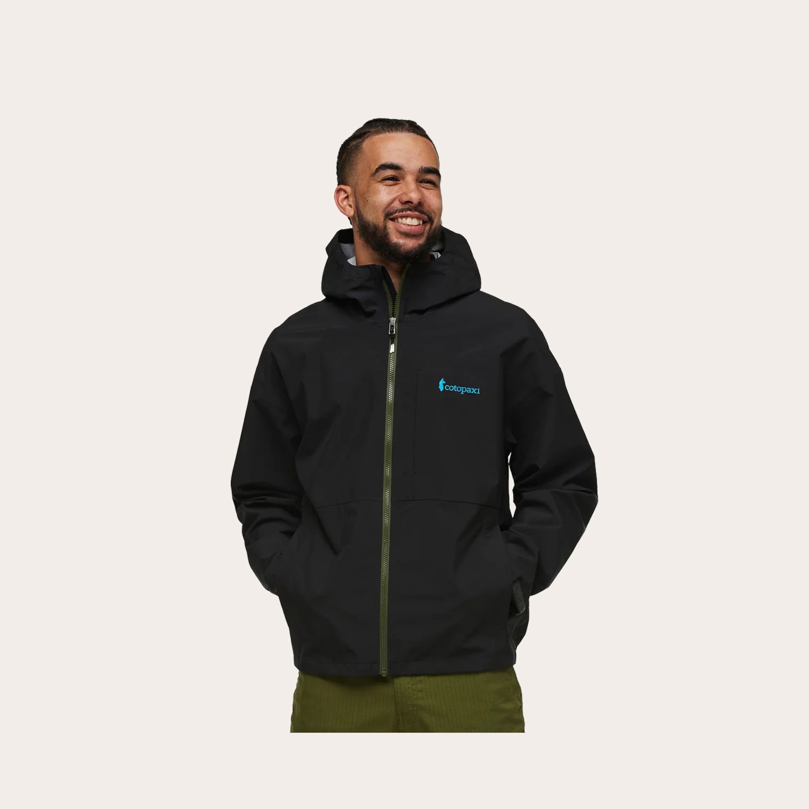 Man wearing a black rain jacket.