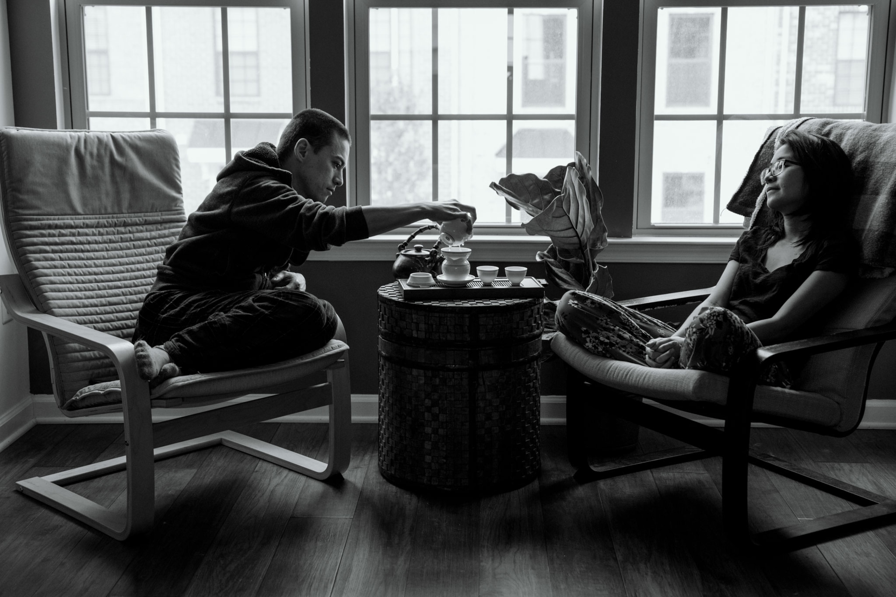 a husband and wife drinking tea