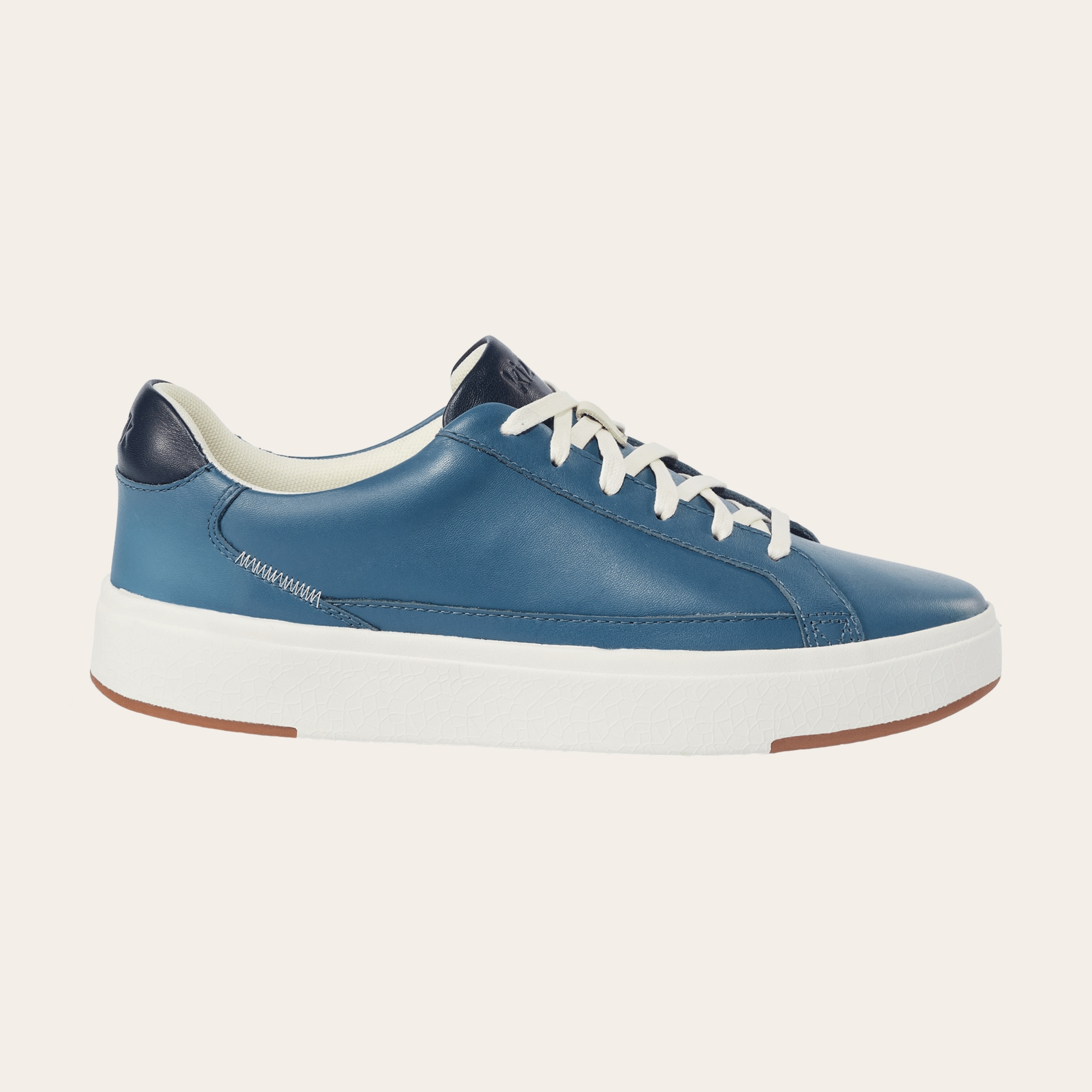 An image of blue and white slip-on shoes.