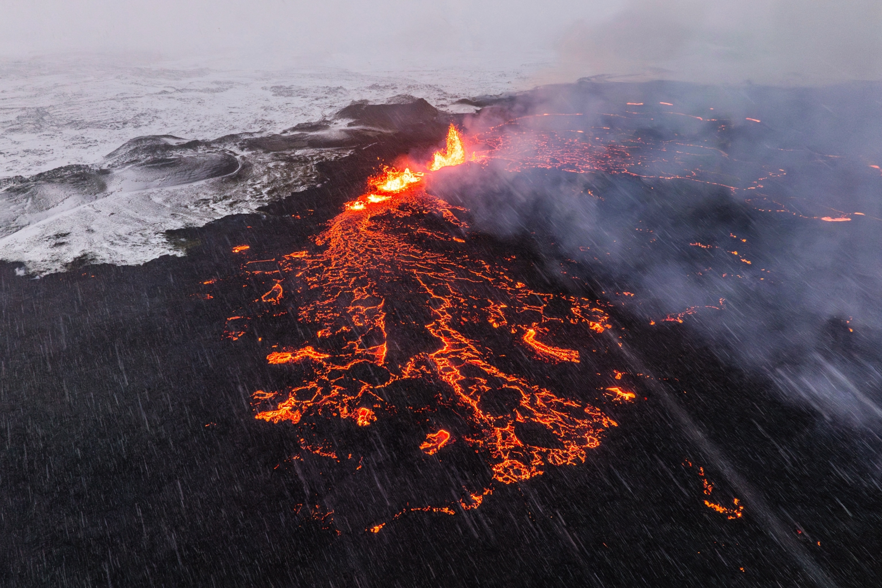An aerial view of an active volcanic fissure in Grindavik, Iceland
