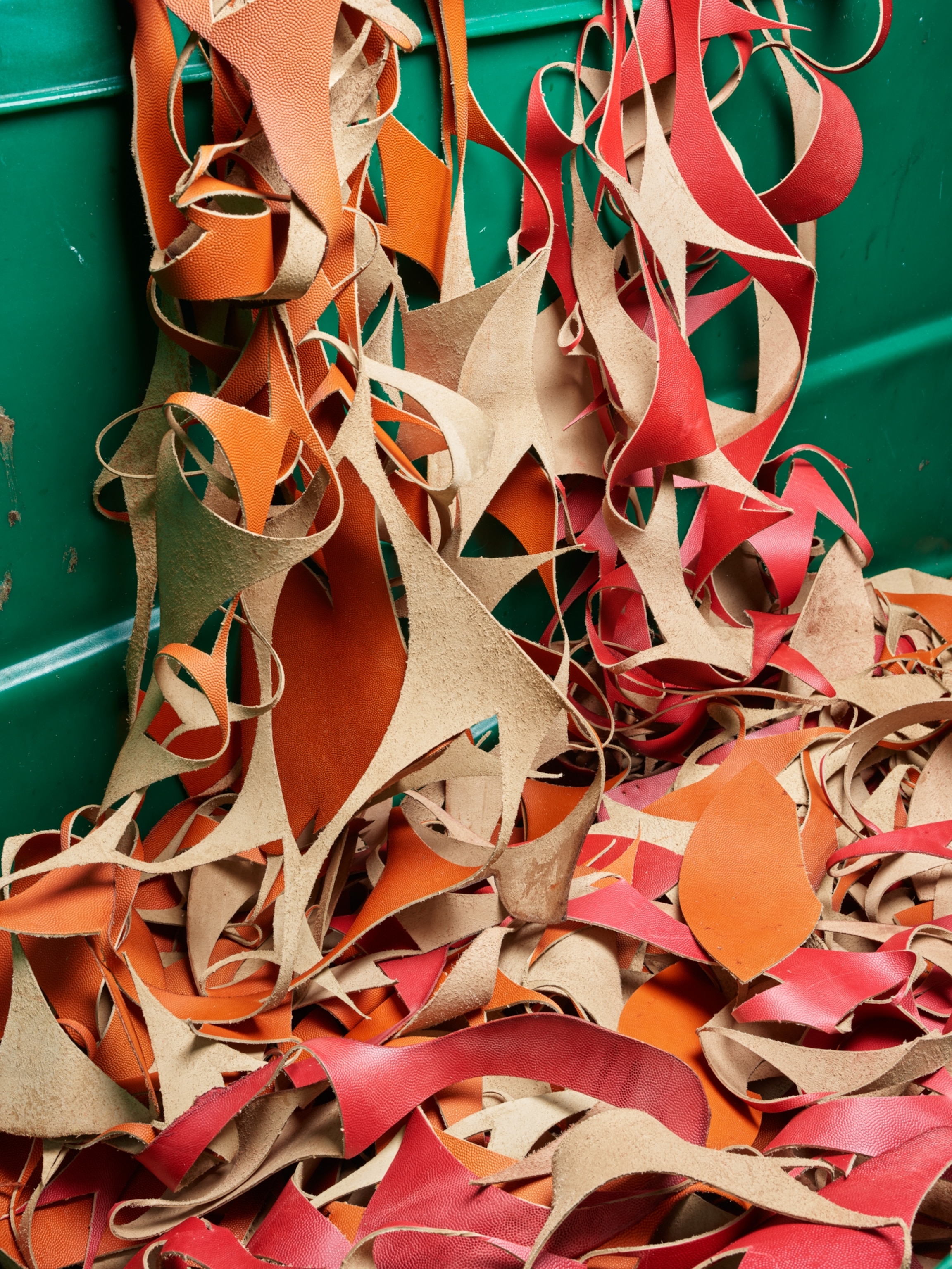 Leather scraps in a football factory.