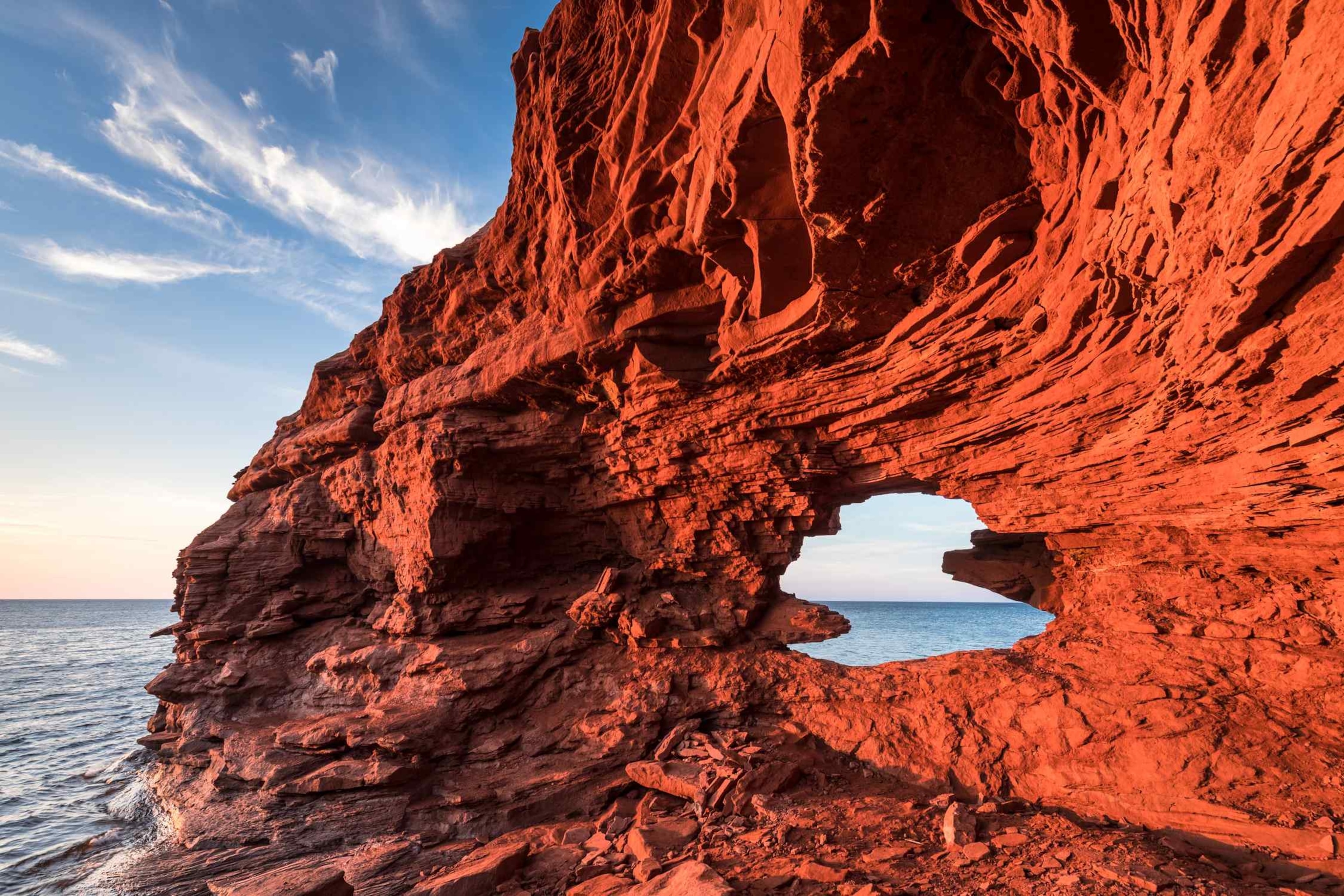 a red-rock cliffs in Prince Edward National Park, Canada