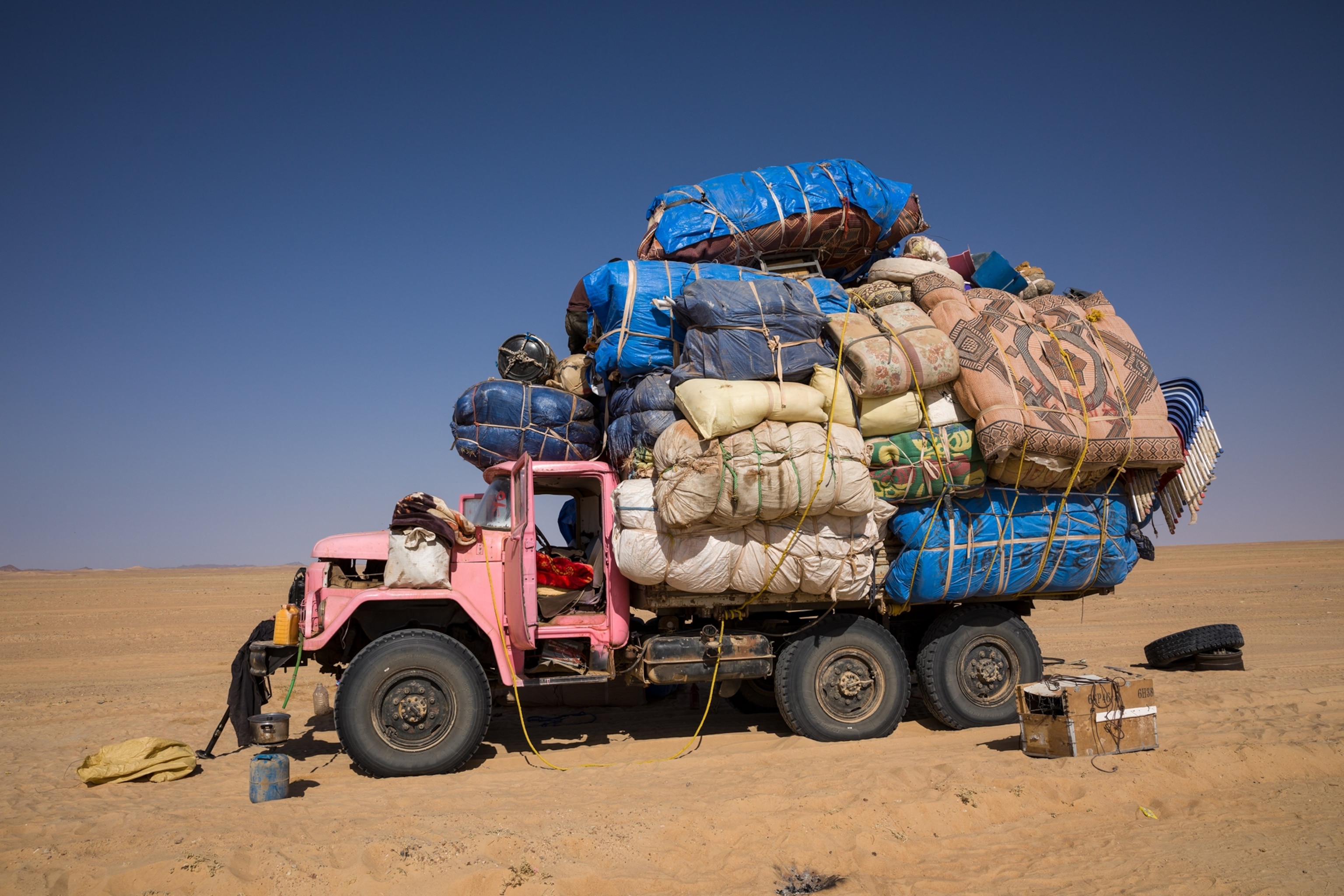 pink truck with goods
