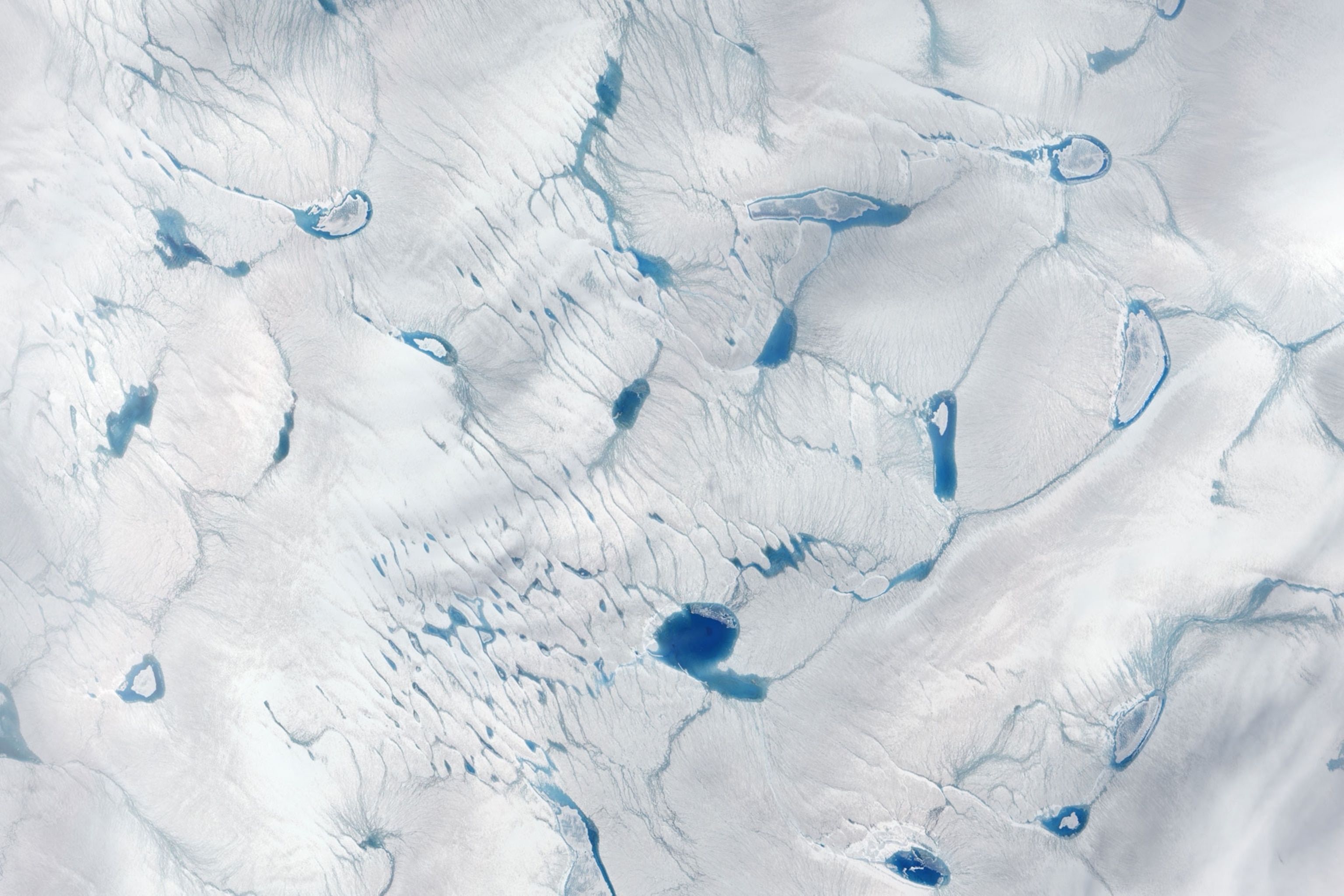 meltwater lakes on the surface of Greenland