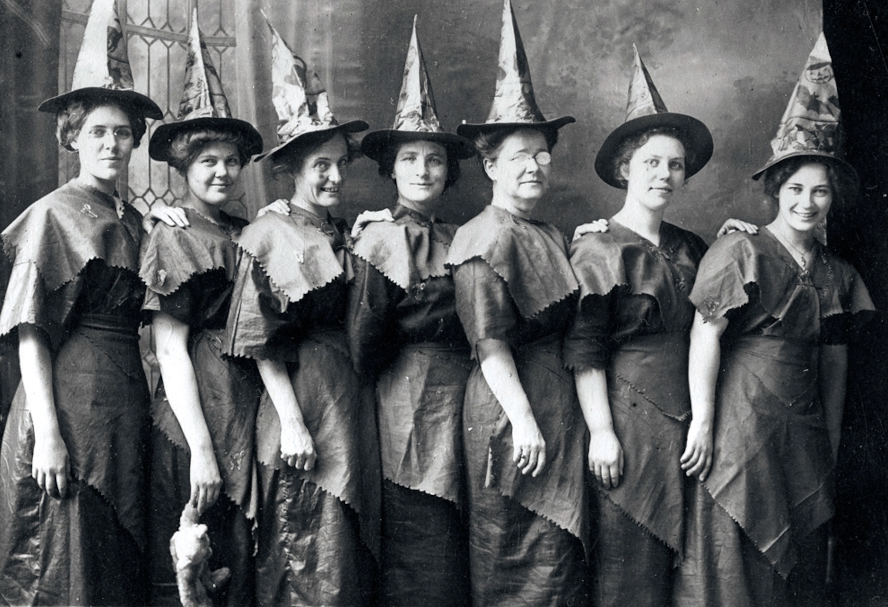 women in witch costumes in 1910.
