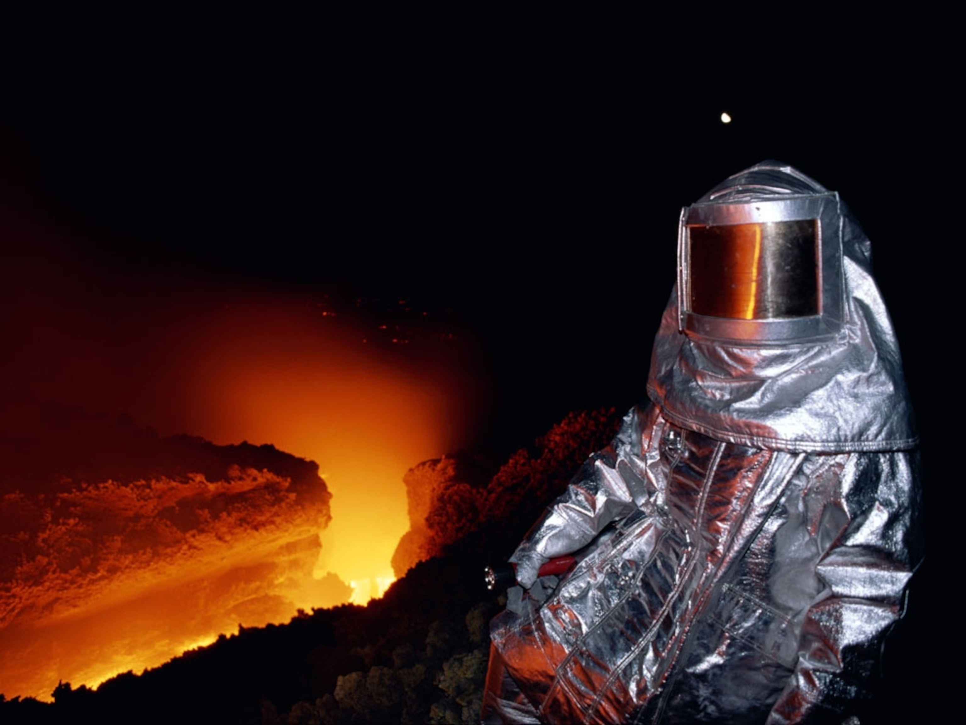Scientist gathers lava samples at Mount Etna