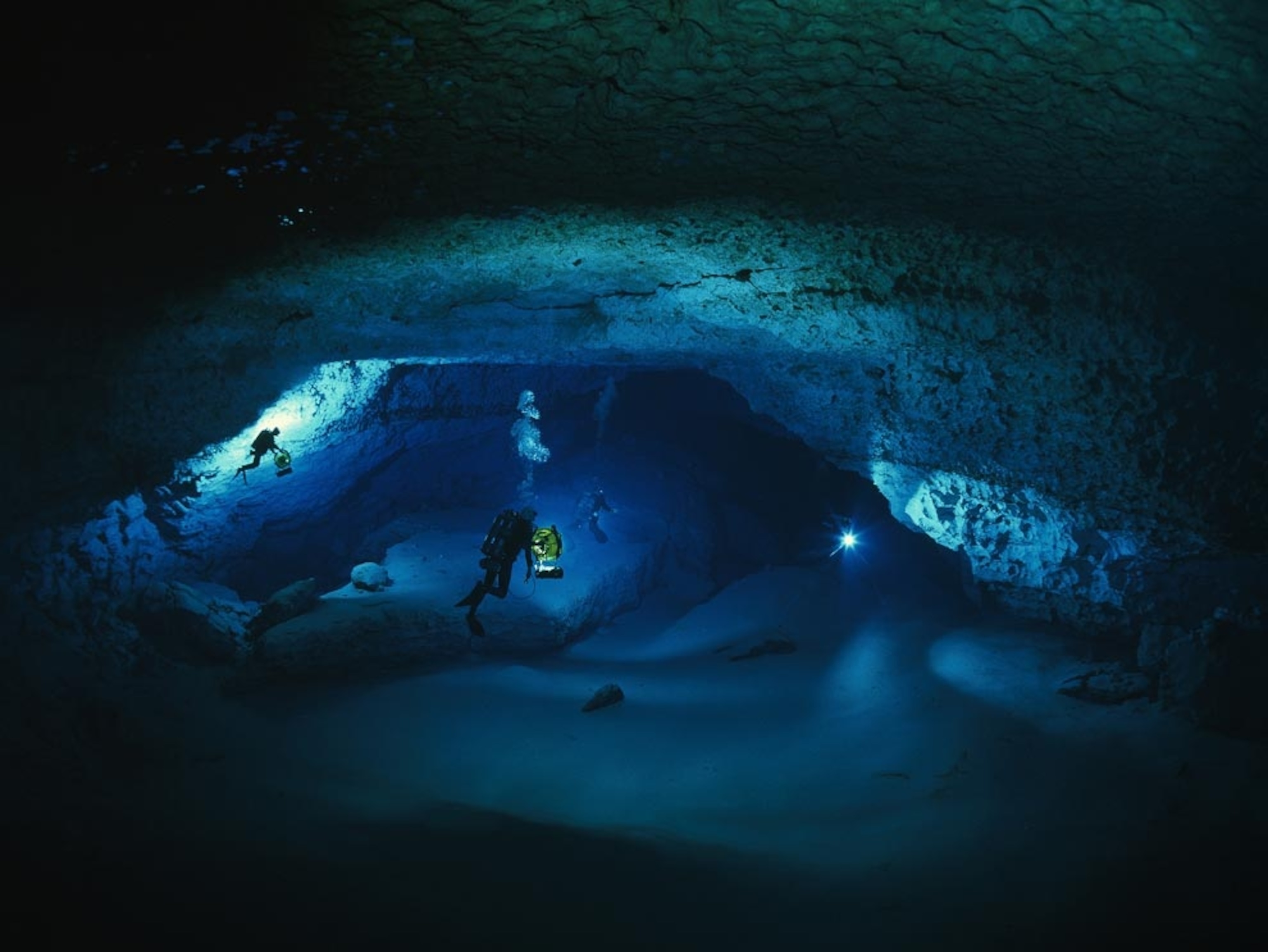 Divers in a chamber of Diepolder Cave