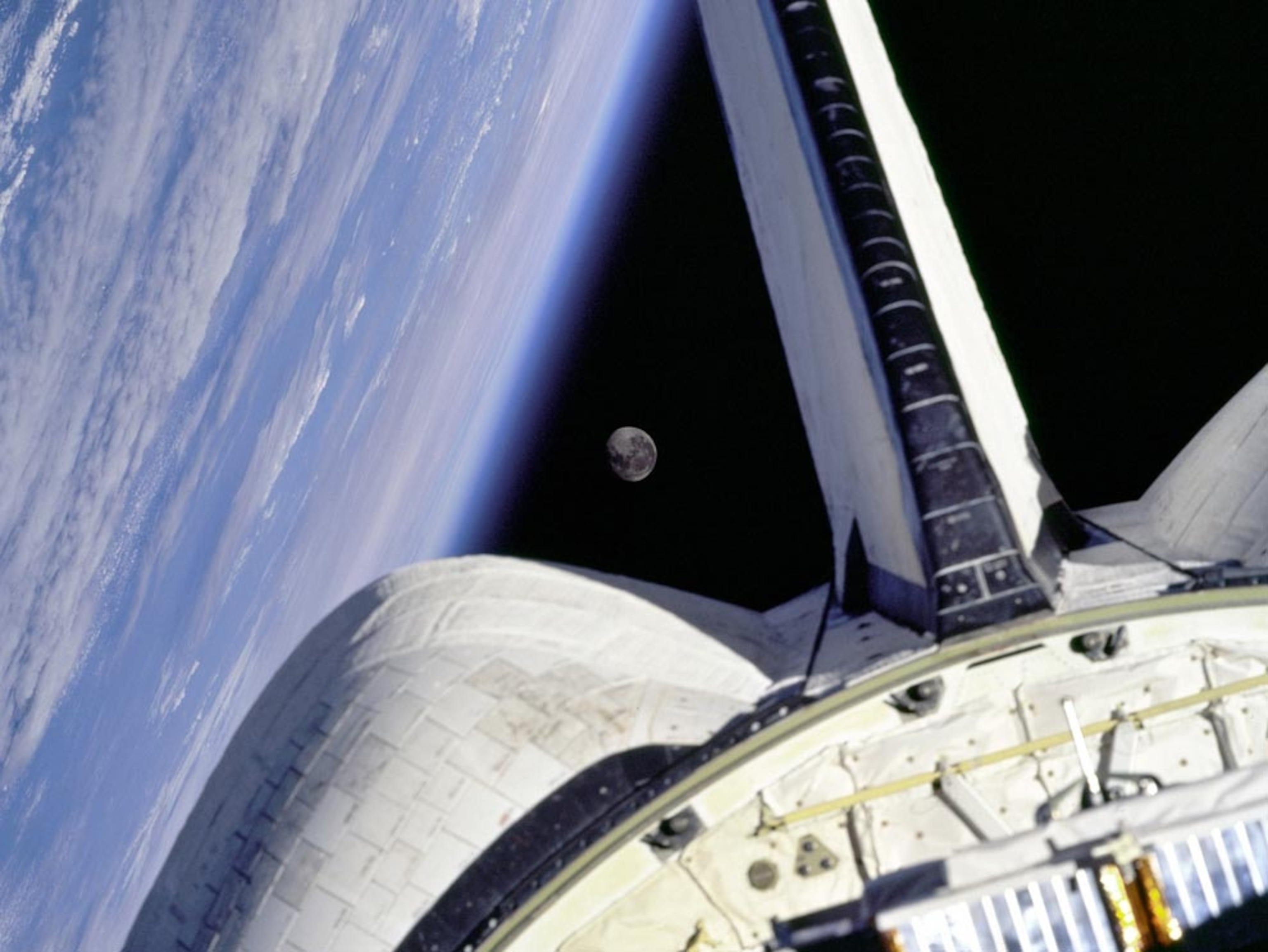the Earth and moon seen from space shuttle