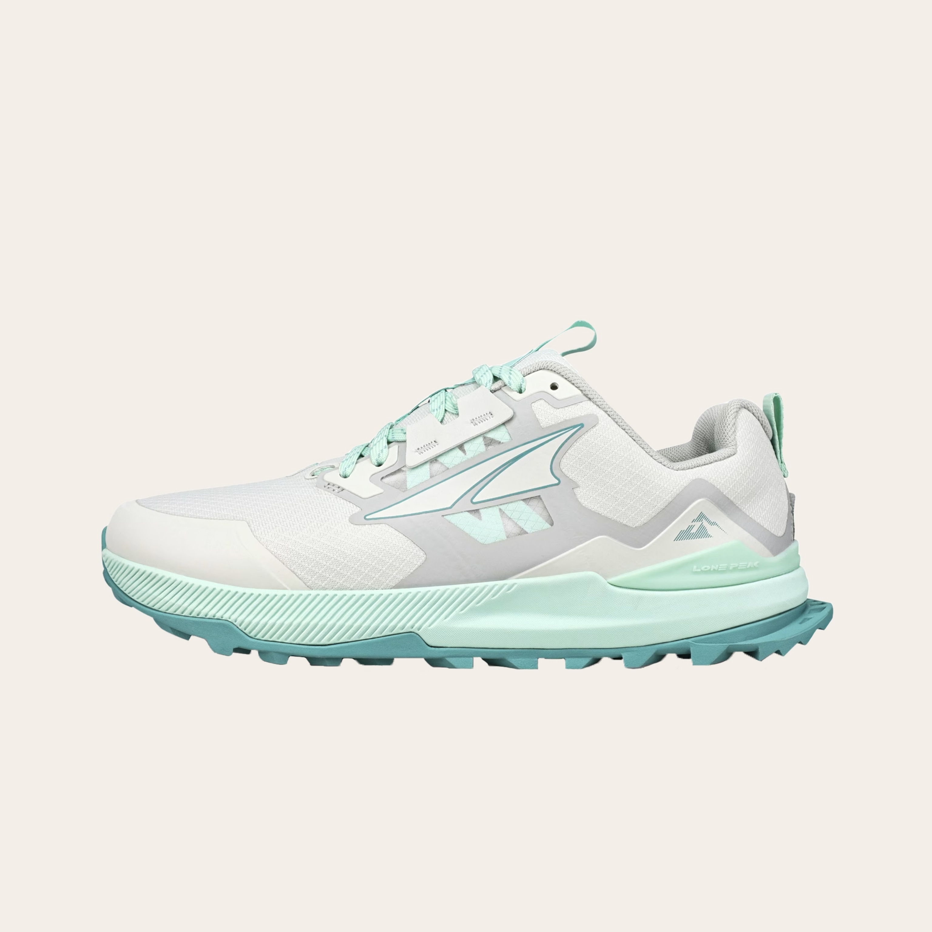 An image of white sneakers with blue accents.