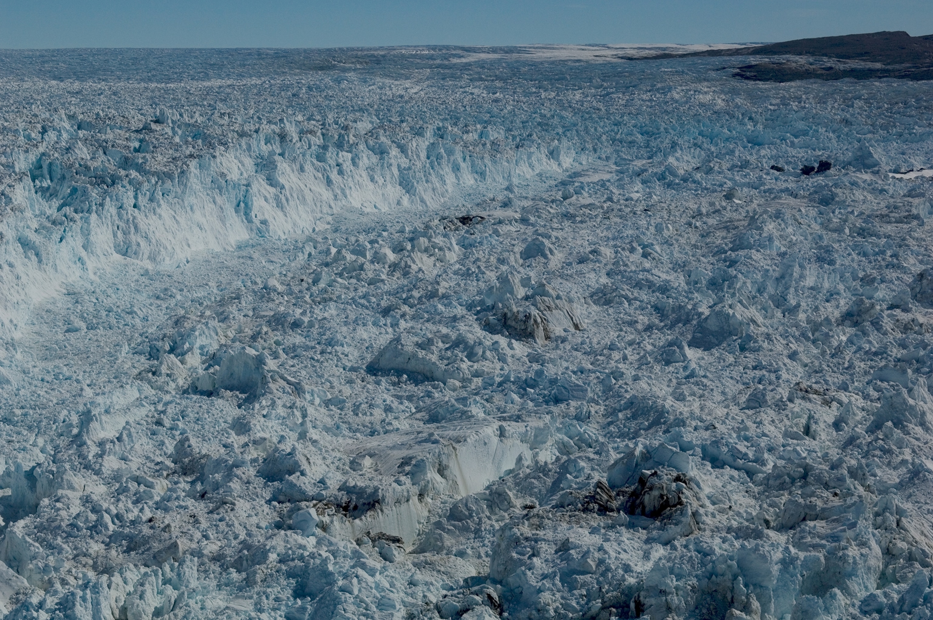 Calving ice floes and icebergs of Jakobshavn Glacier.