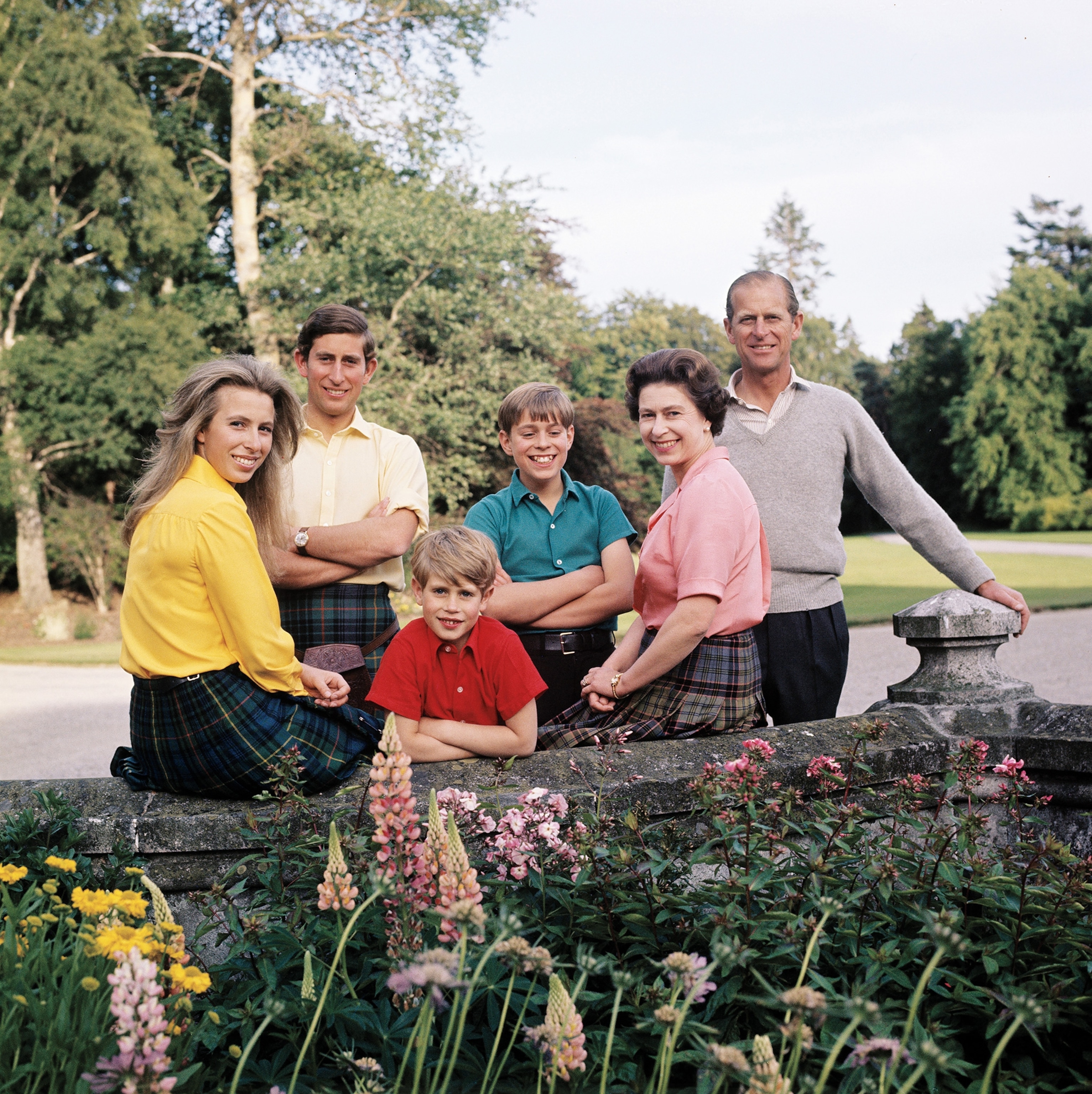 The family poses for a picture at Balmoral in honor of Elizabeth and Philip’s silver wedding anniversary in 1972.