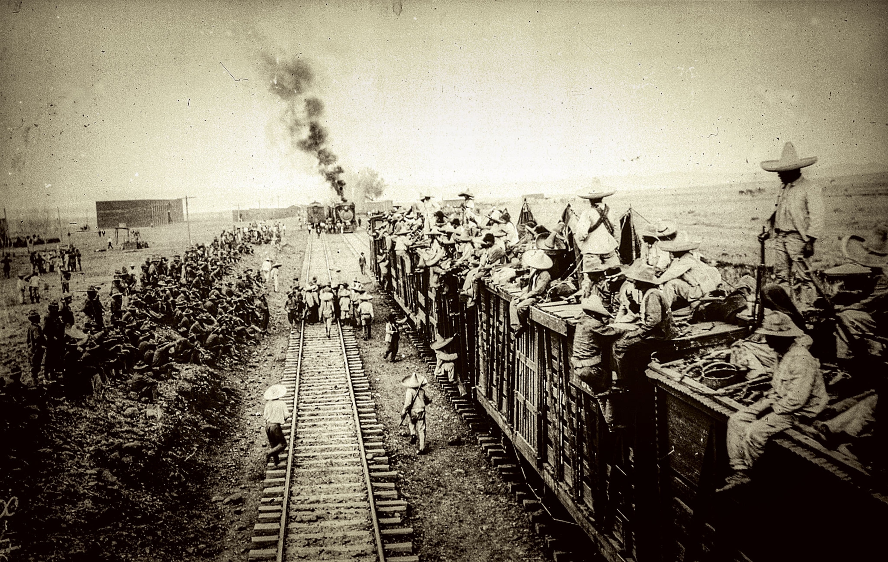 In a photograph, Carranza’s troops crammed into a train head into battle against Villa’s army
