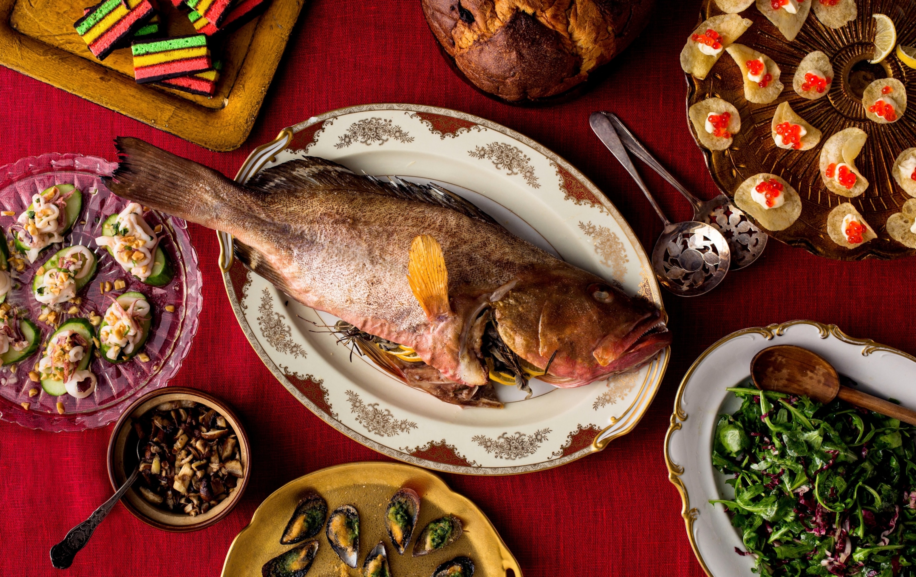 Whole roasted fish with lemons, herbs and wild mushrooms