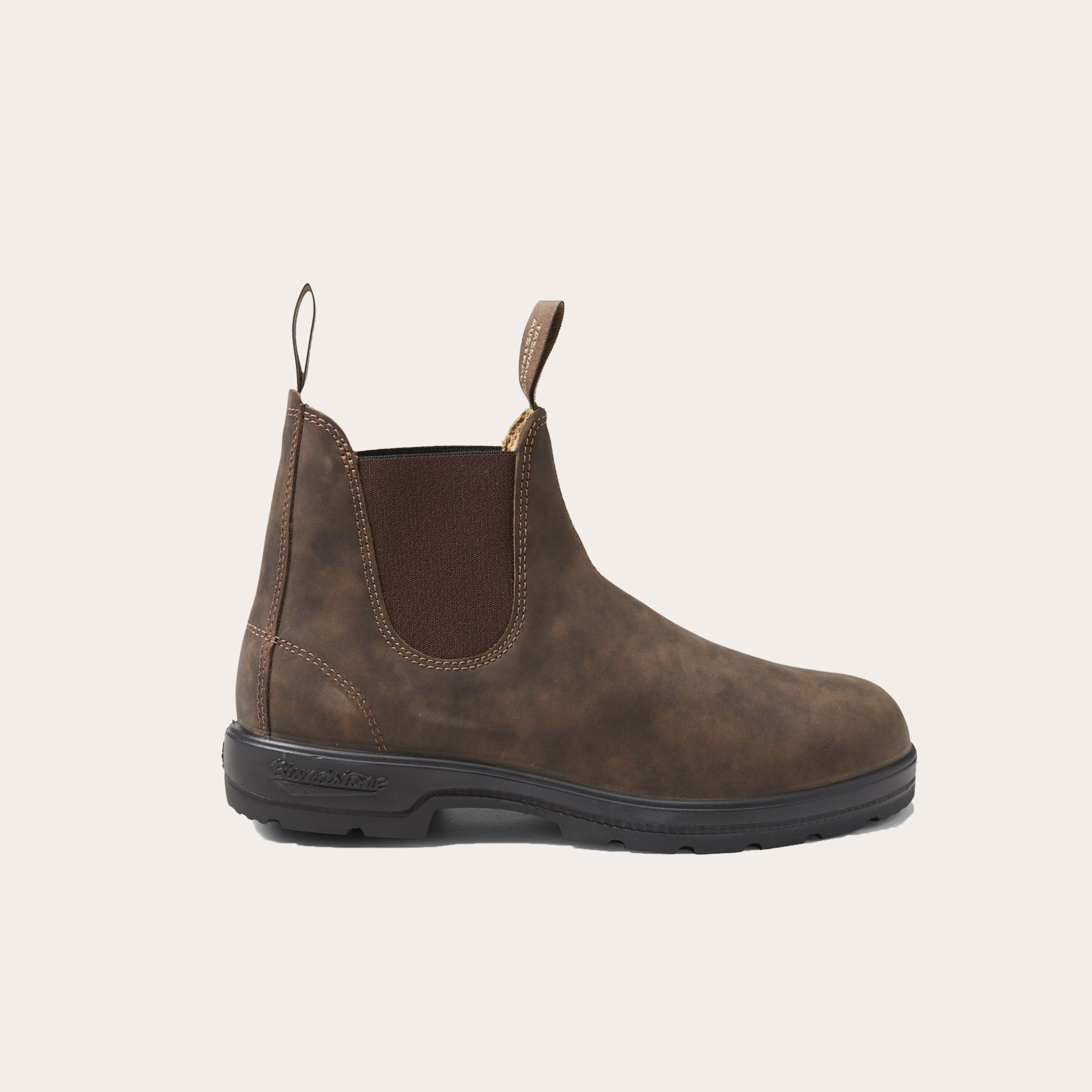 One ankle high brown boot