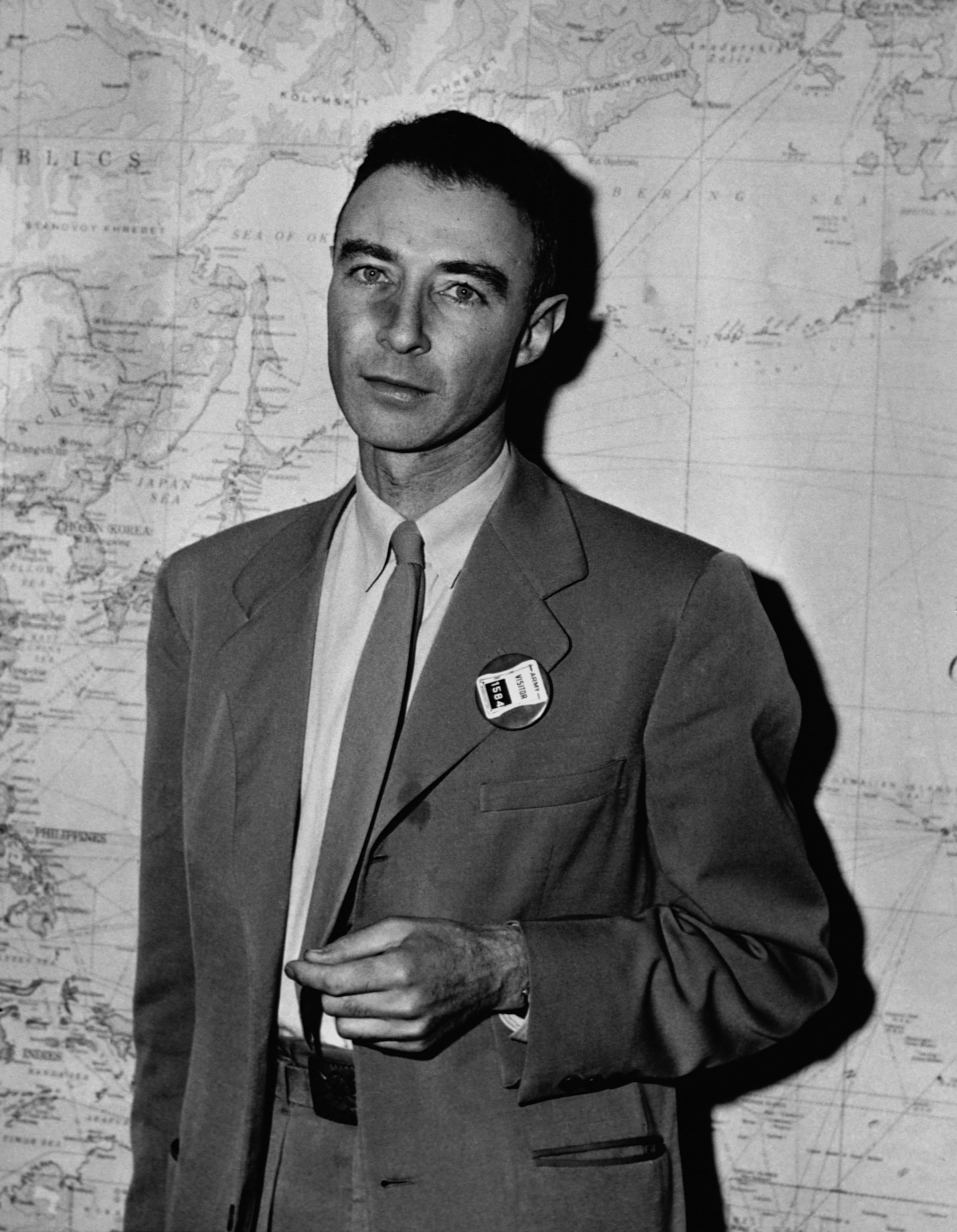 a black and white portrait of a young Oppenheimer