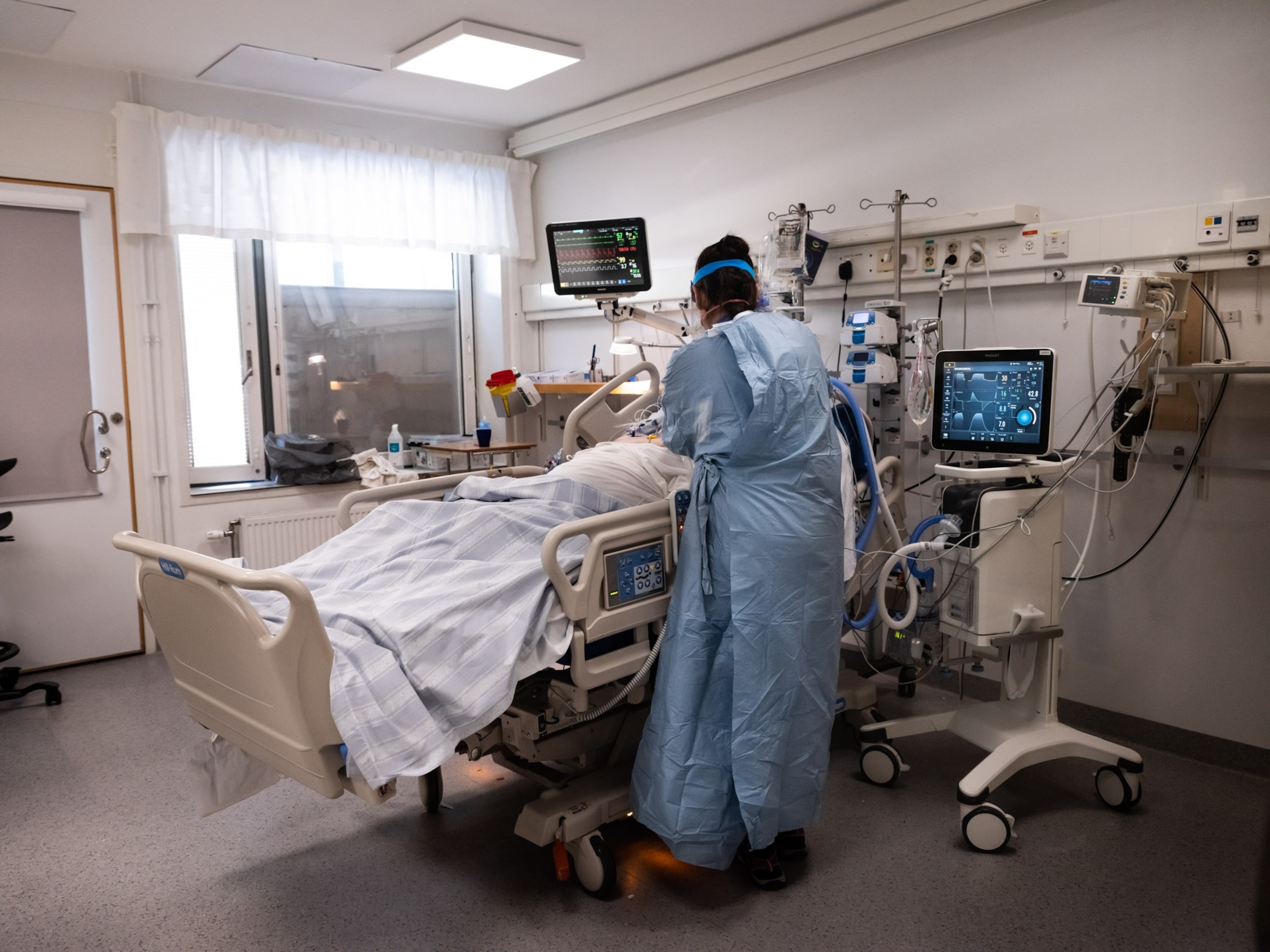 a medical worker tending to a patient