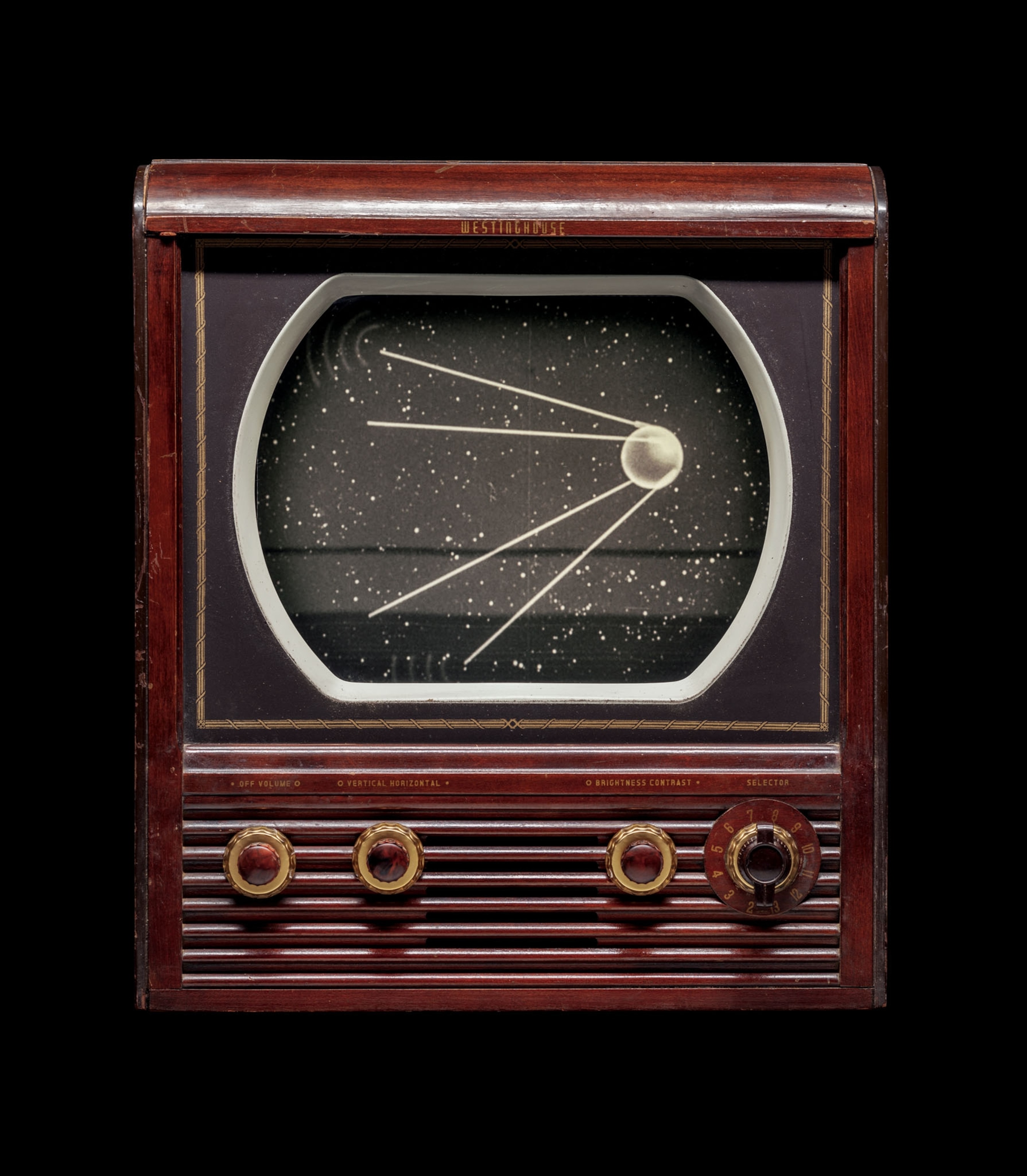 vintage era television showing a black and white sputnik