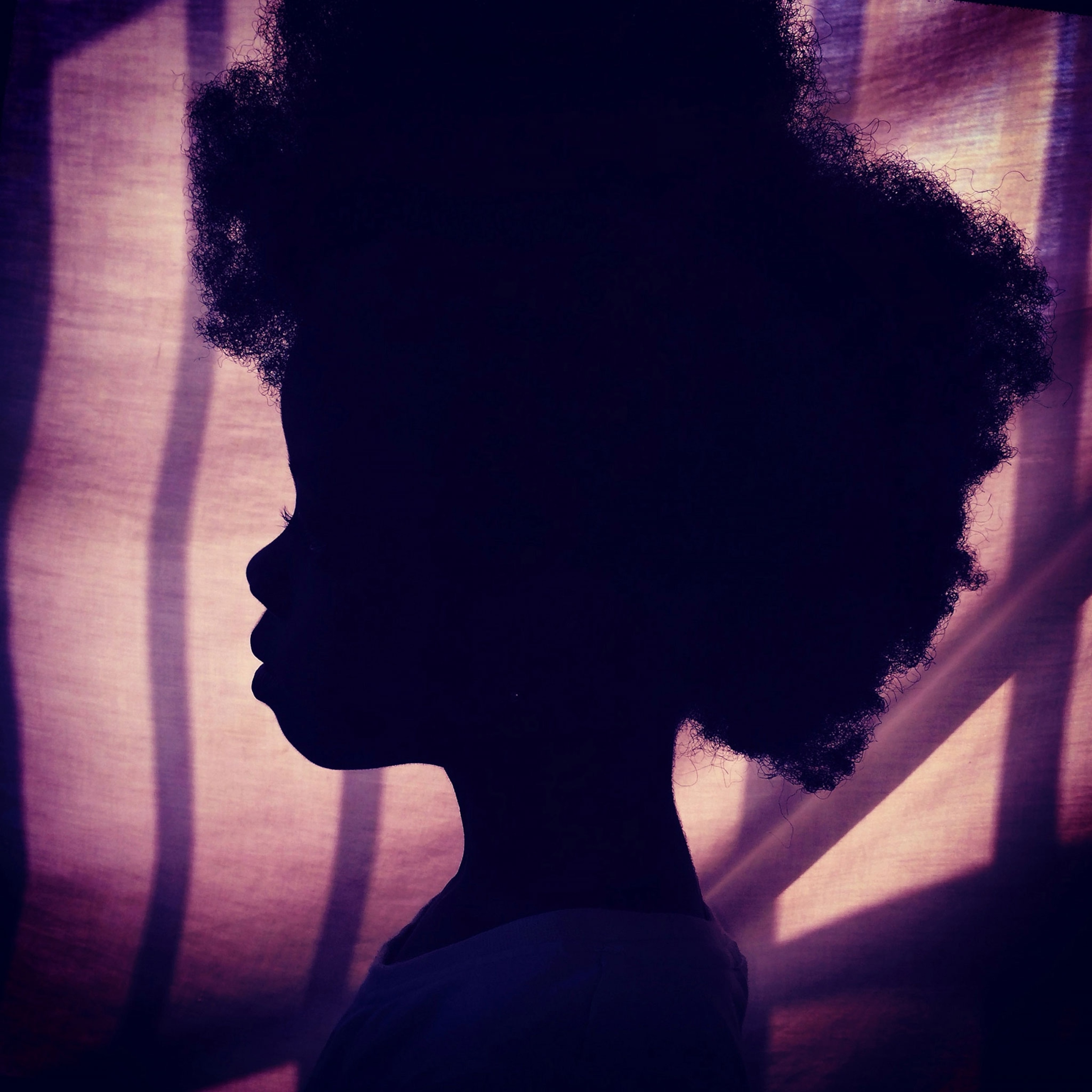 a silhouette of a girl