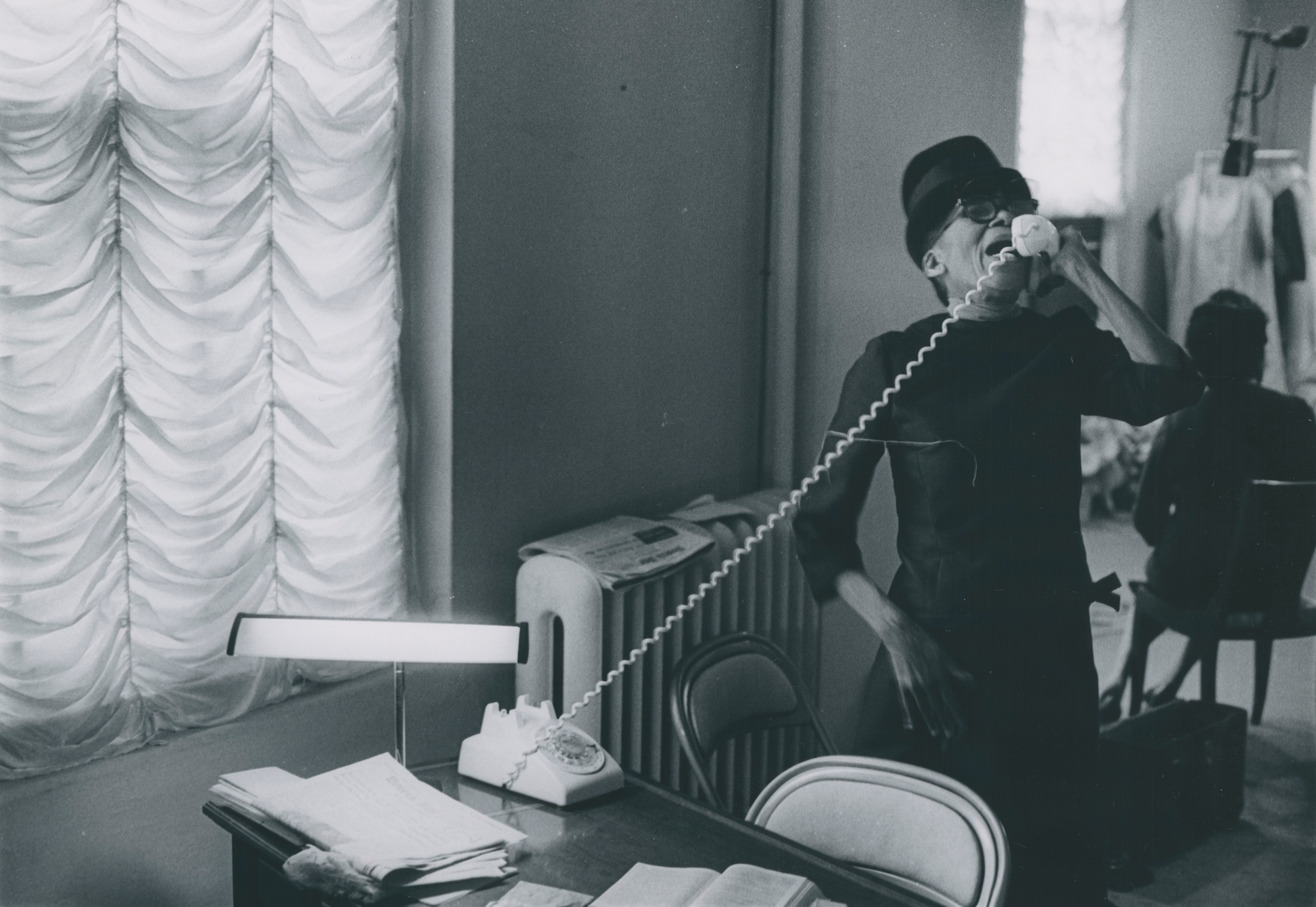 Designer Ann Lowe on the telephone.