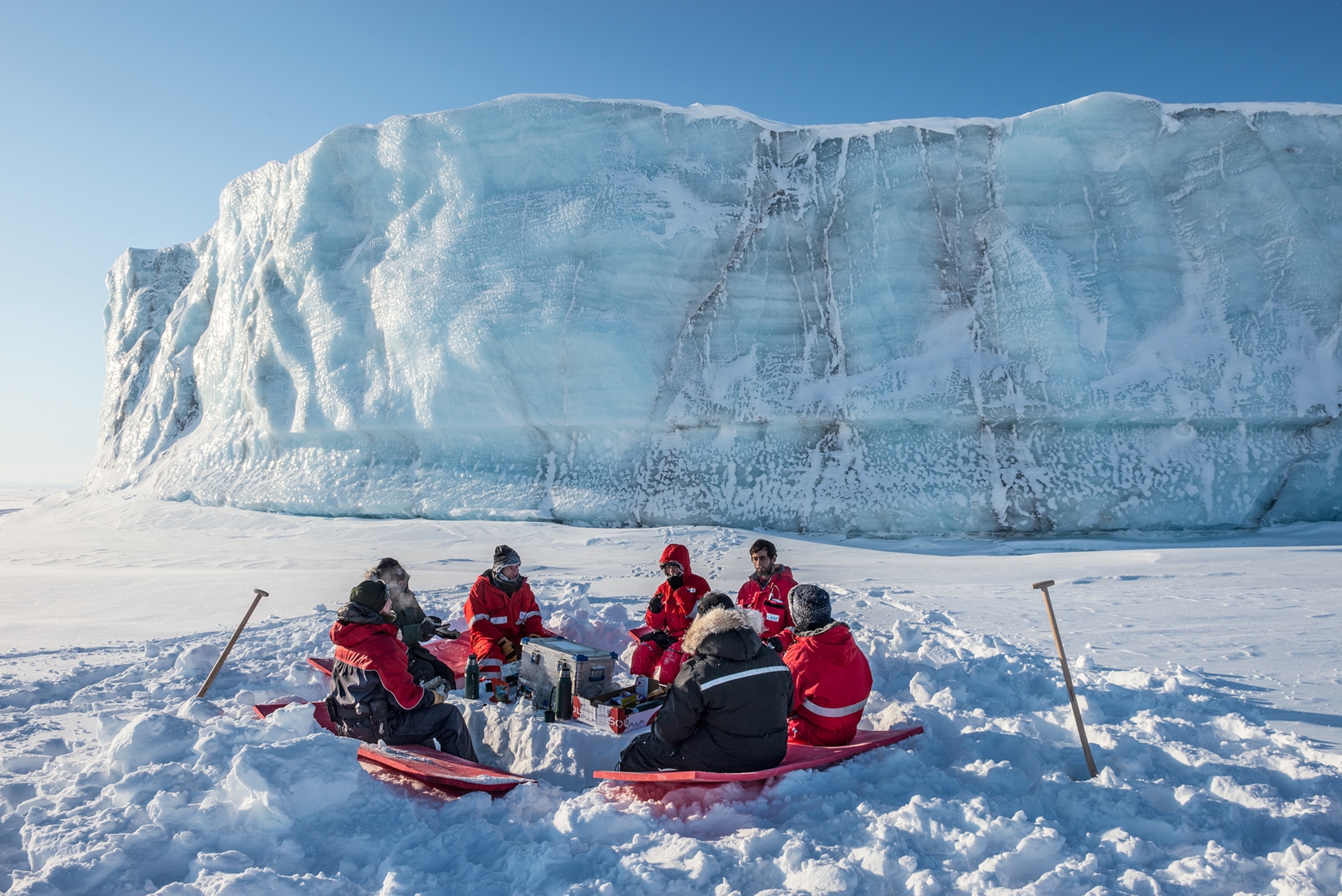 researchers eating lunch on the ice