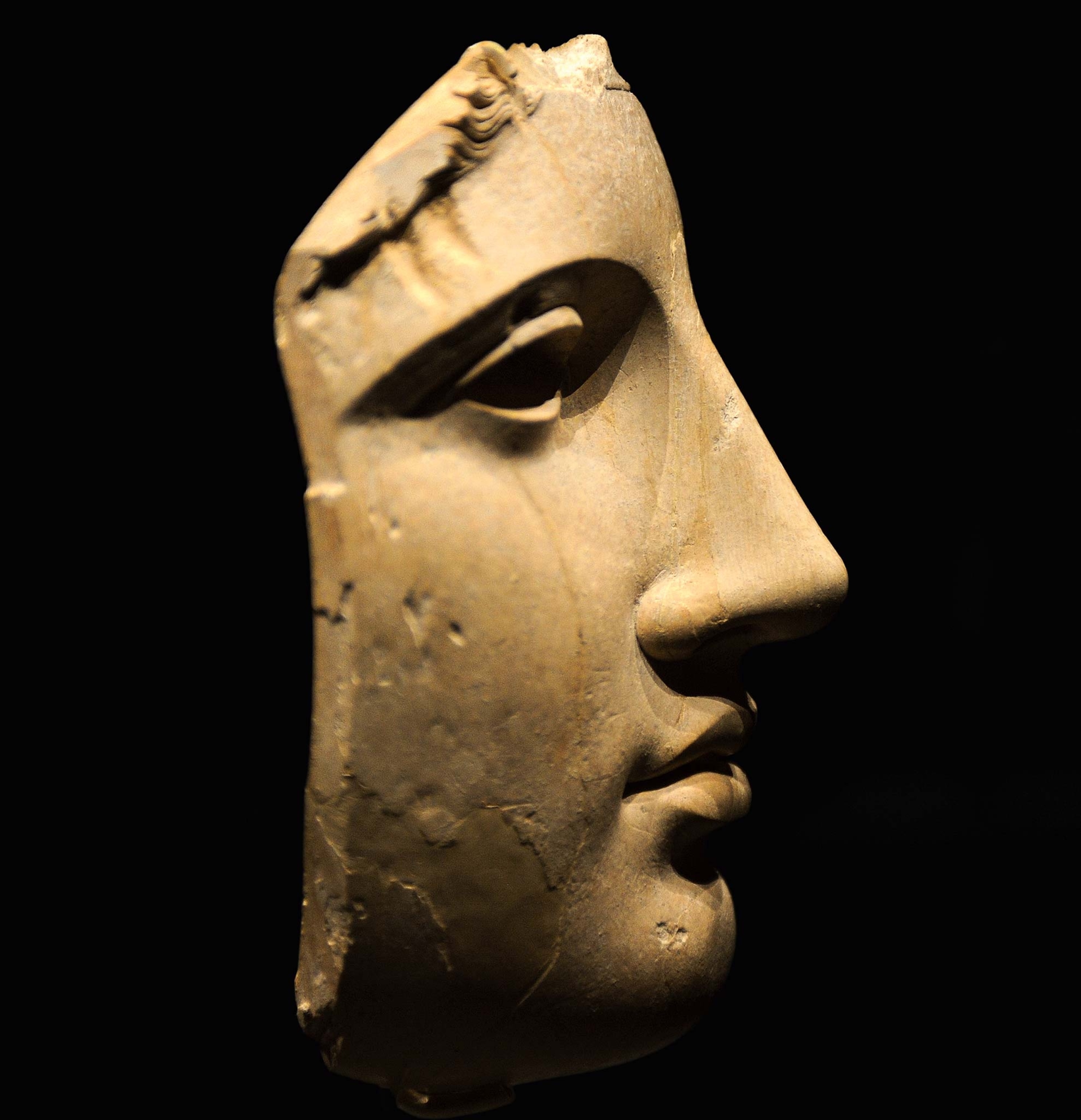 A first-century B.C. ivory sculpture, found by tomb raiders in 1994, likely belonged to a chryselephantine statue, perhaps of Apollo.
