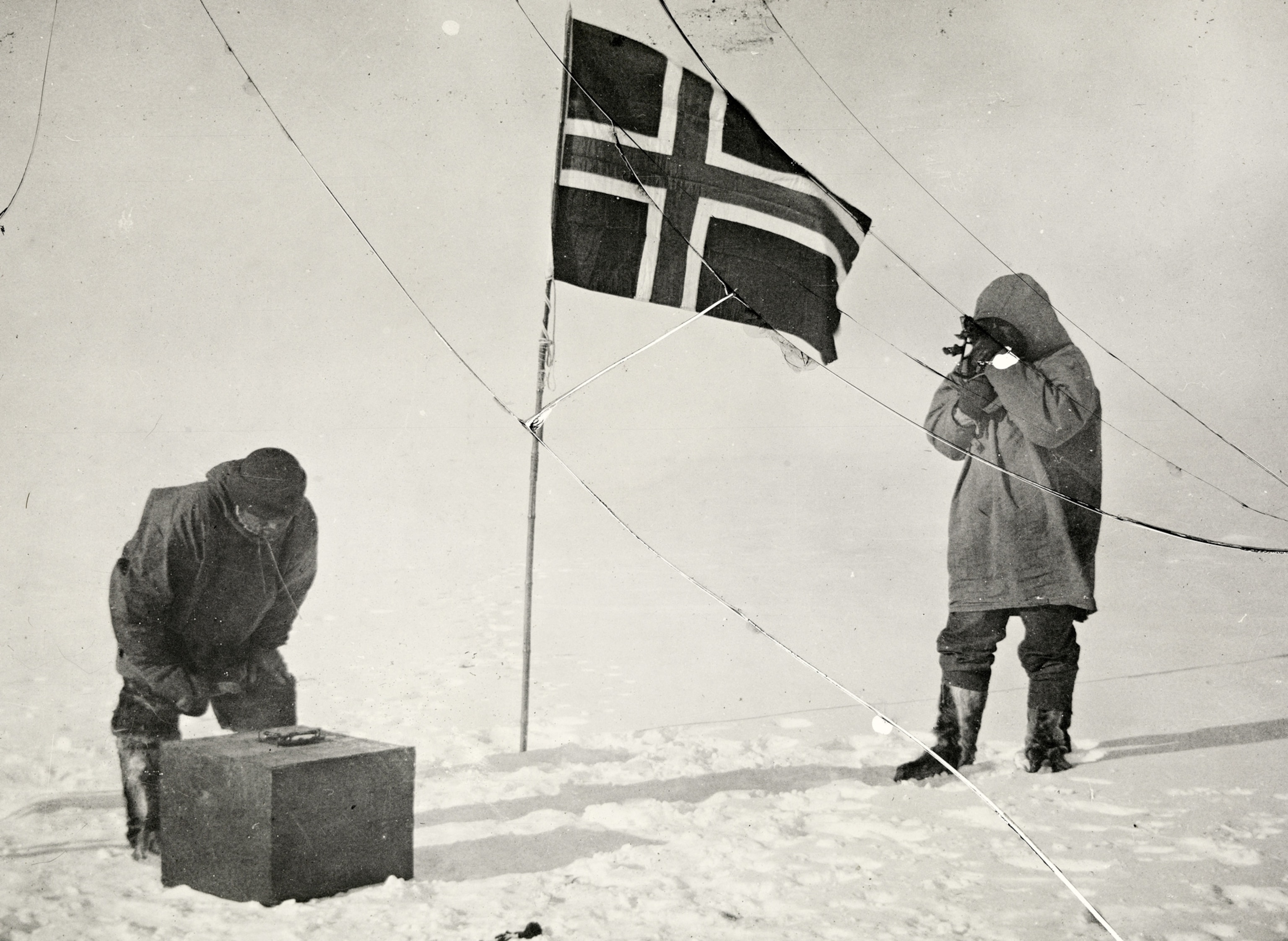 the Norwegian flag marking Amundsen's team's victory of making it to the South Pole first