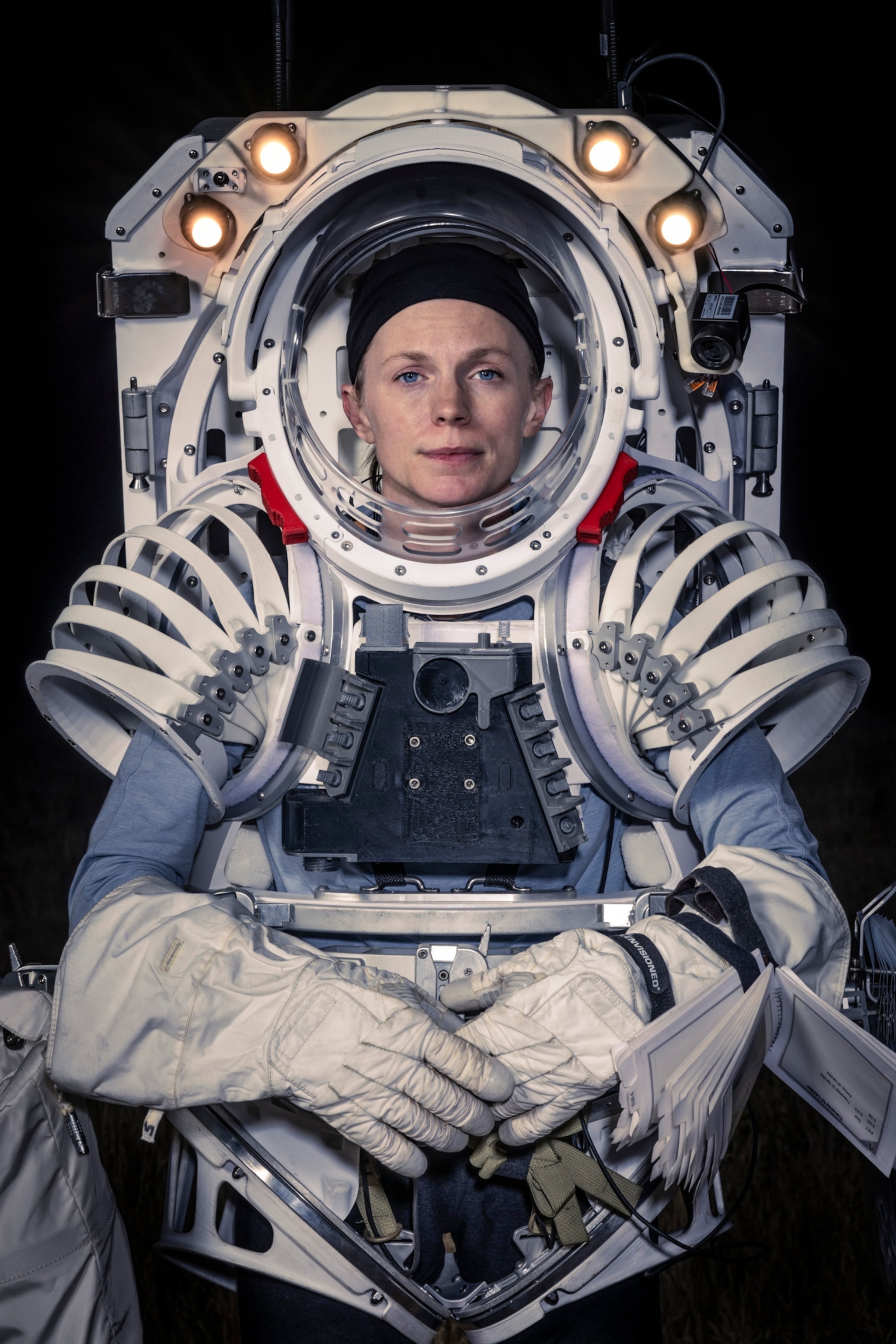 Astronaut Zena Cardman photographed wearing a training space suit during the JETT Field Test 3 training mission at the San Francisco Volcanic Field